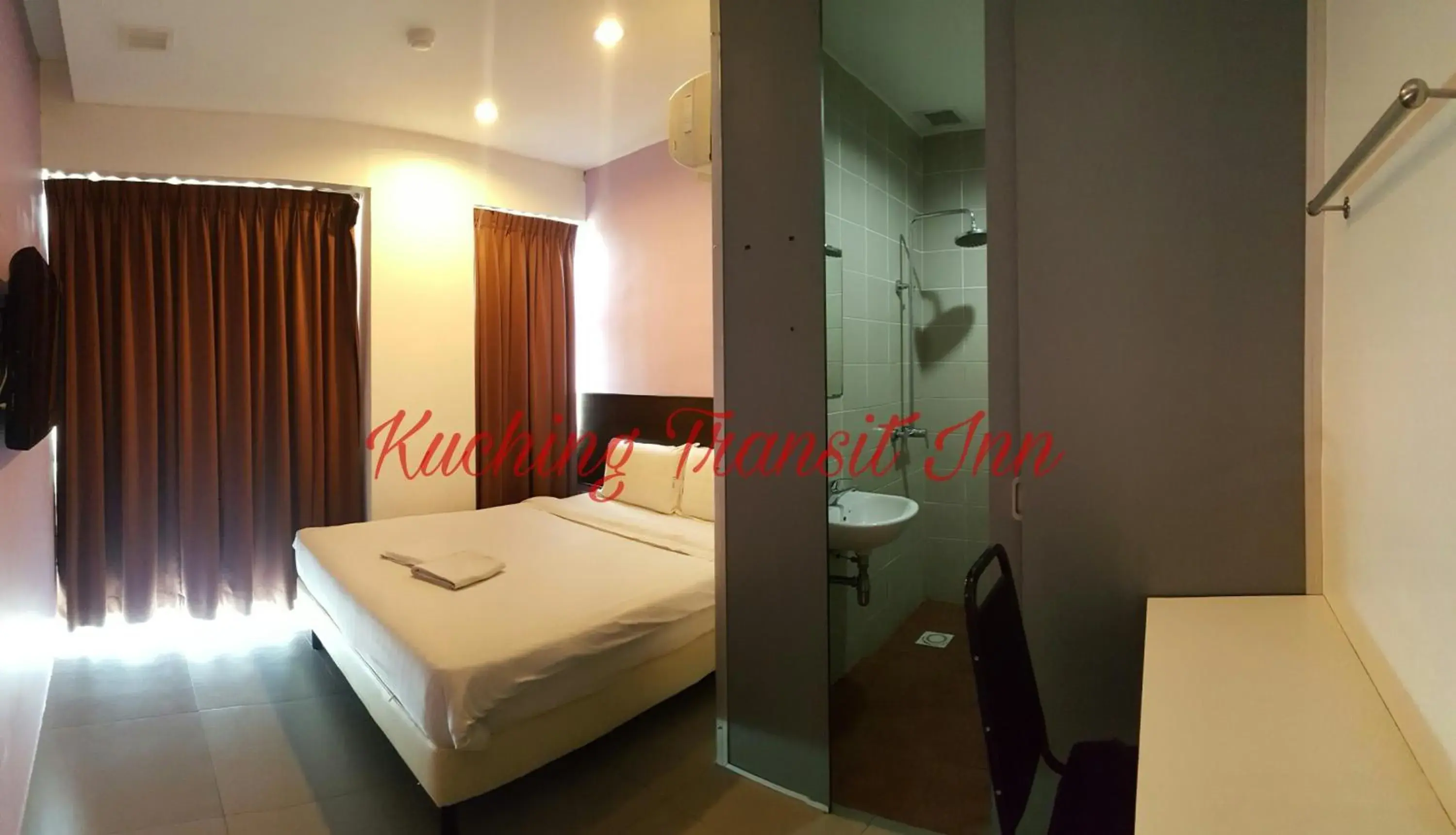 Photo of the whole room, Bed in Kuching Transit Inn Photo of the whole room, Bed in Kuching Transit Inn