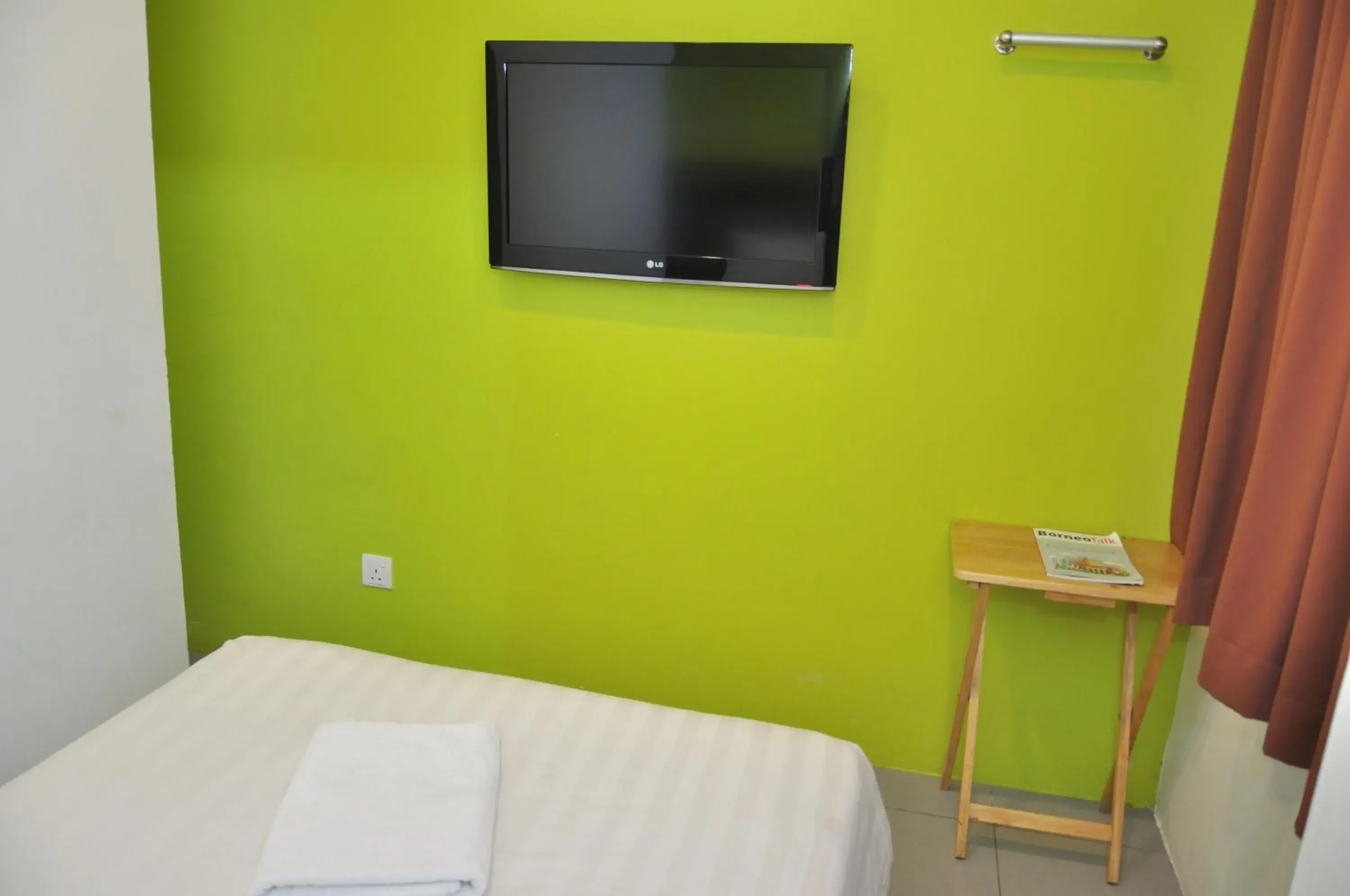TV and multimedia, Bed in Kuching Transit Inn TV and multimedia, Bed in Kuching Transit Inn