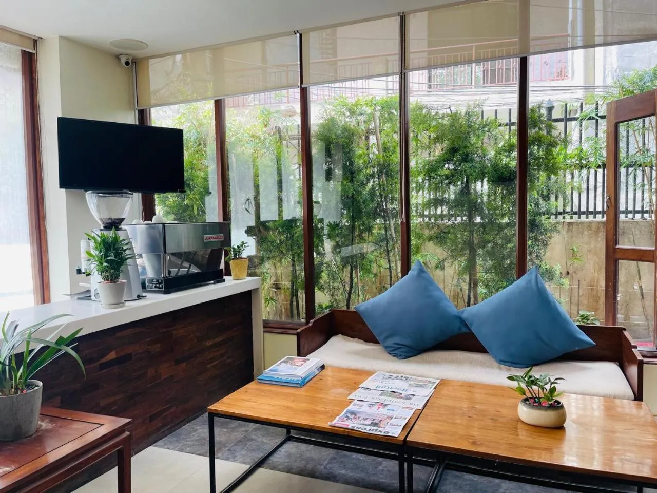 Seating area in Timber House by Tara Group