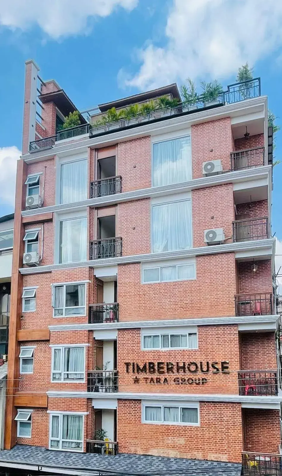 Property building in Timber House by Tara Group Property building in Timber House by Tara Group