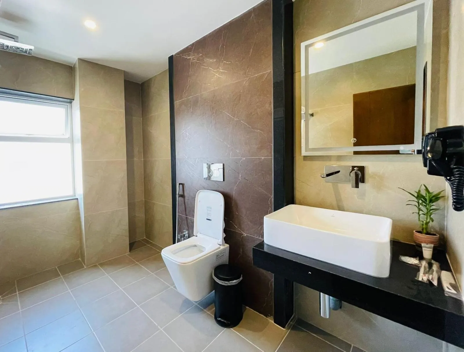 Bathroom in Timber House by Tara Group
