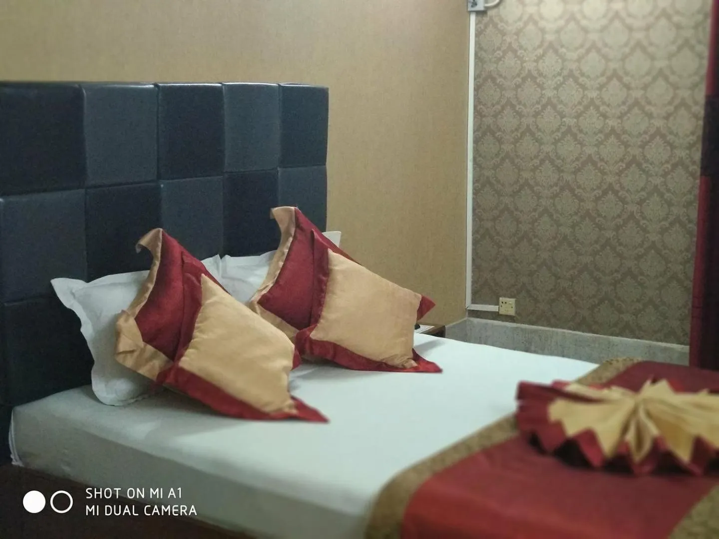 Bed in Tiger Garden Int Hotel