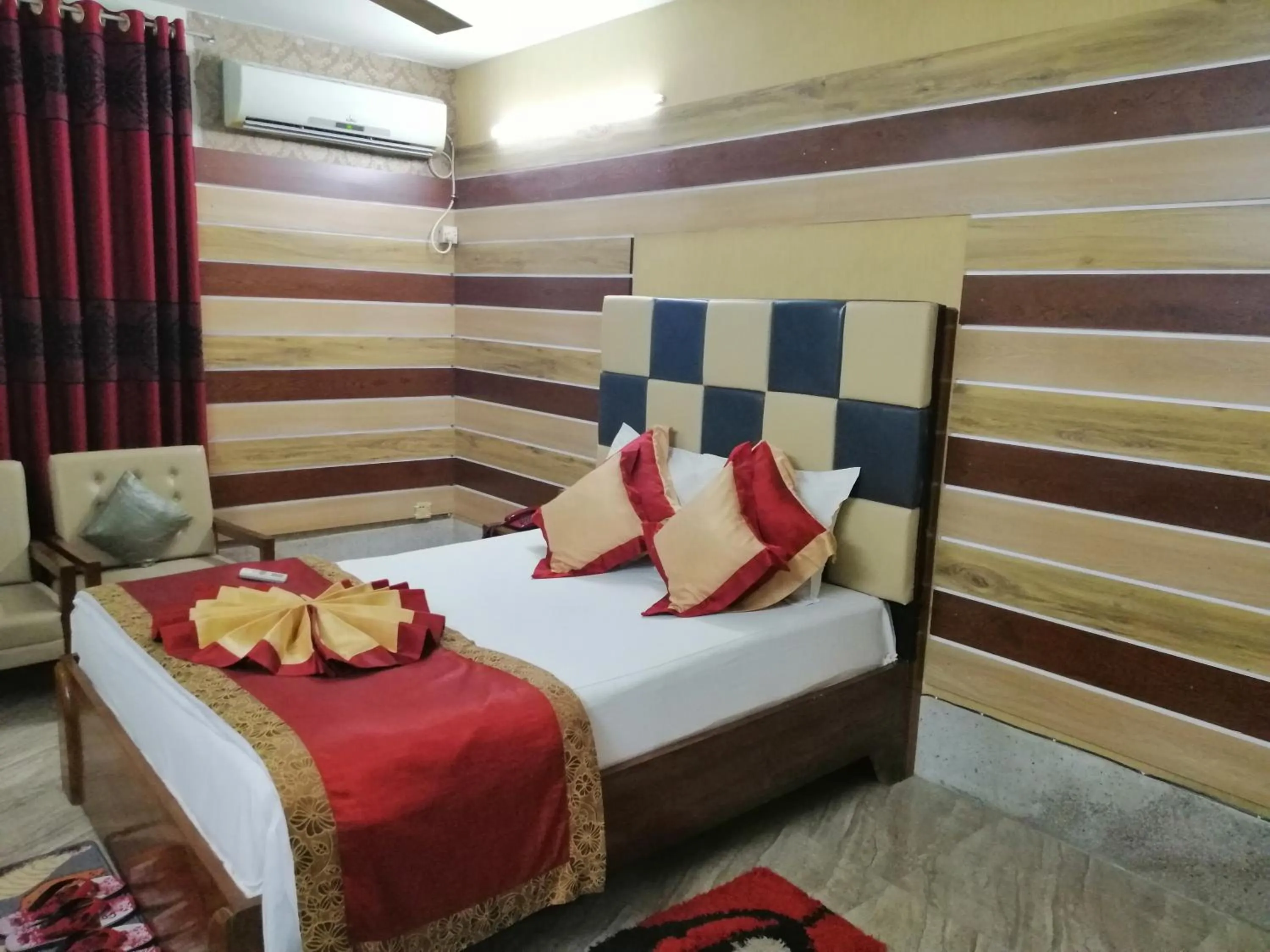 Bed in Tiger Garden Int Hotel