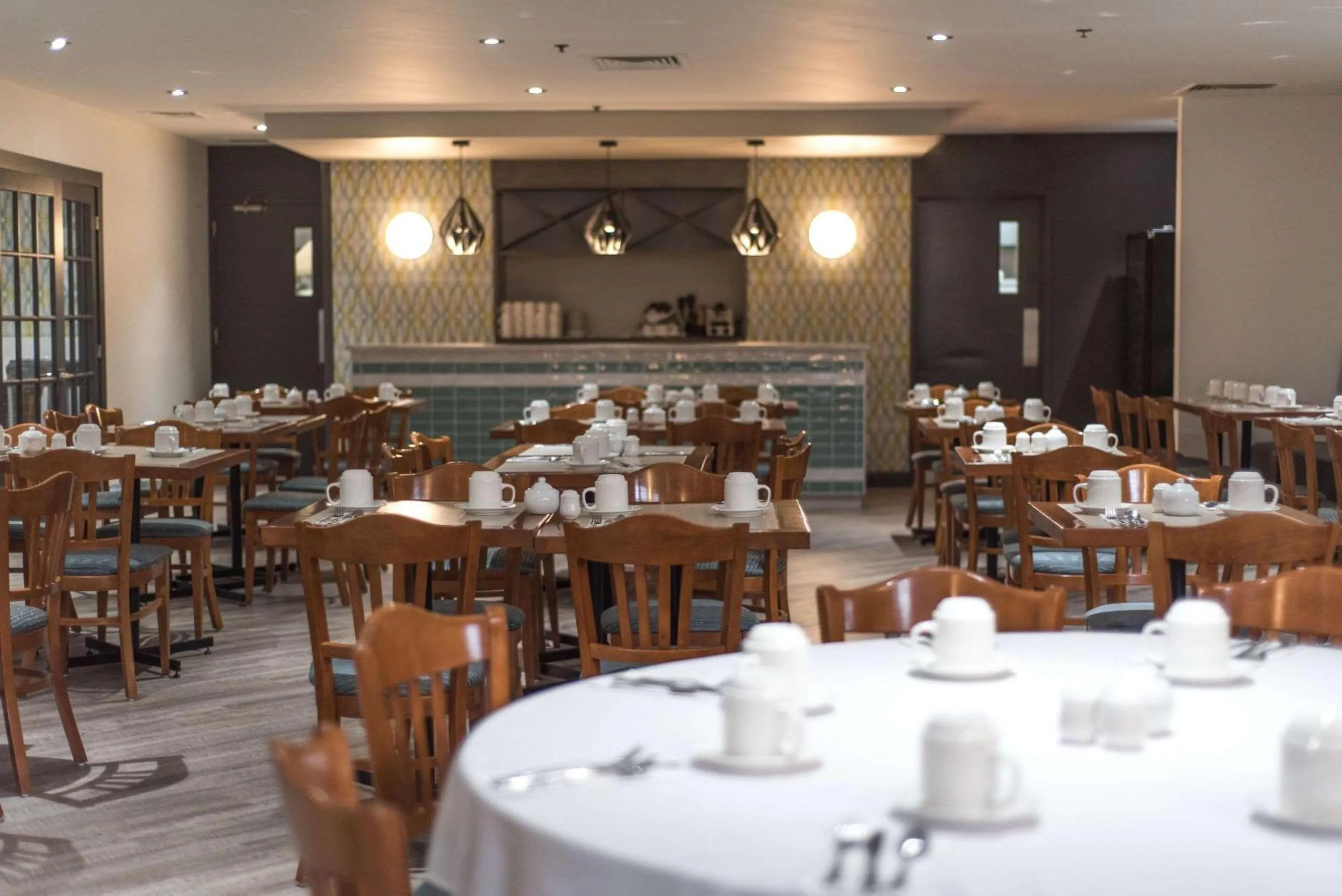 Restaurant/places to eat in Hotel Le Victorin, an Ascend Hotel Collection Member