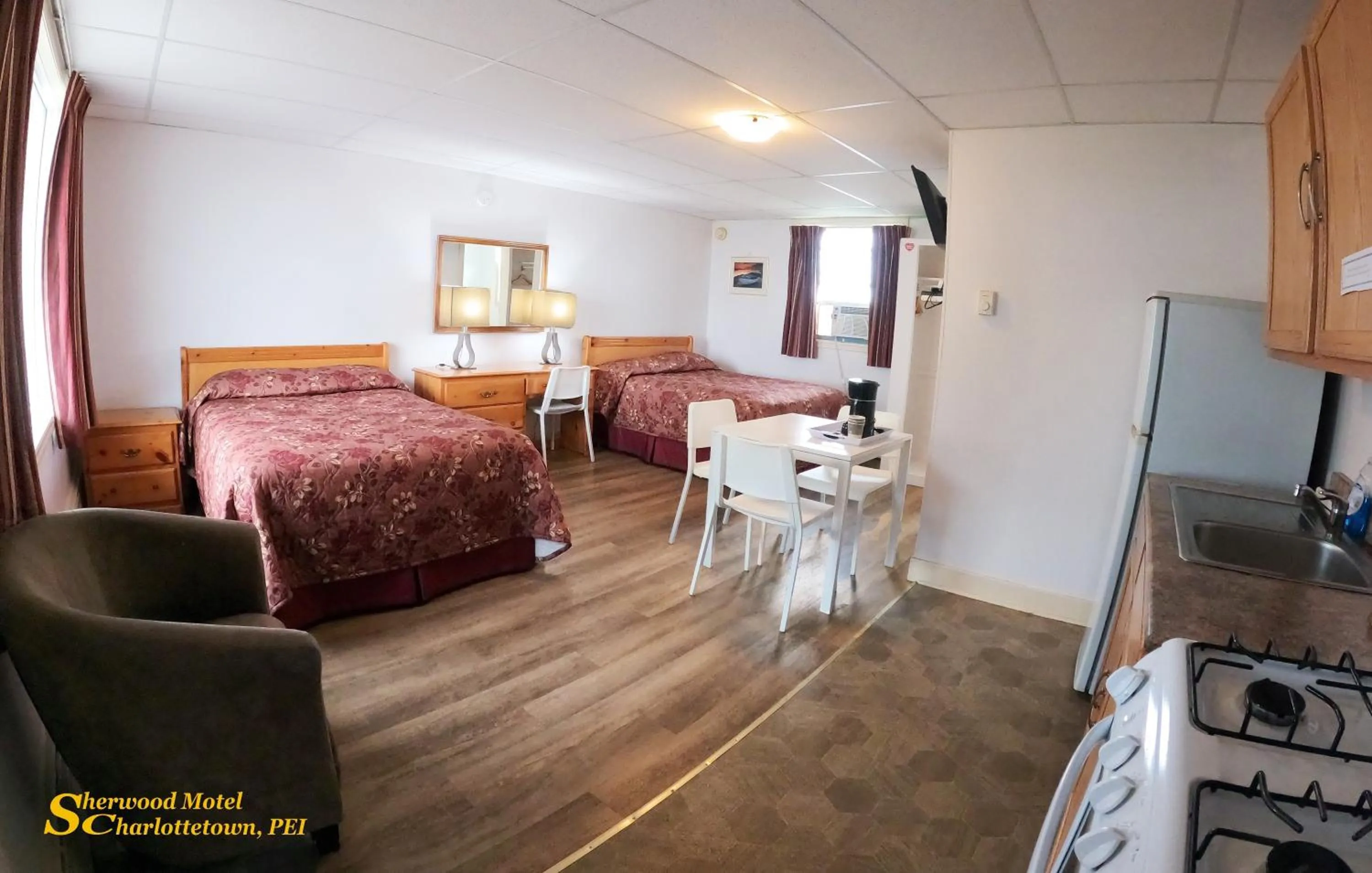 Bed in Sherwood Inn and Motel Charlottetown