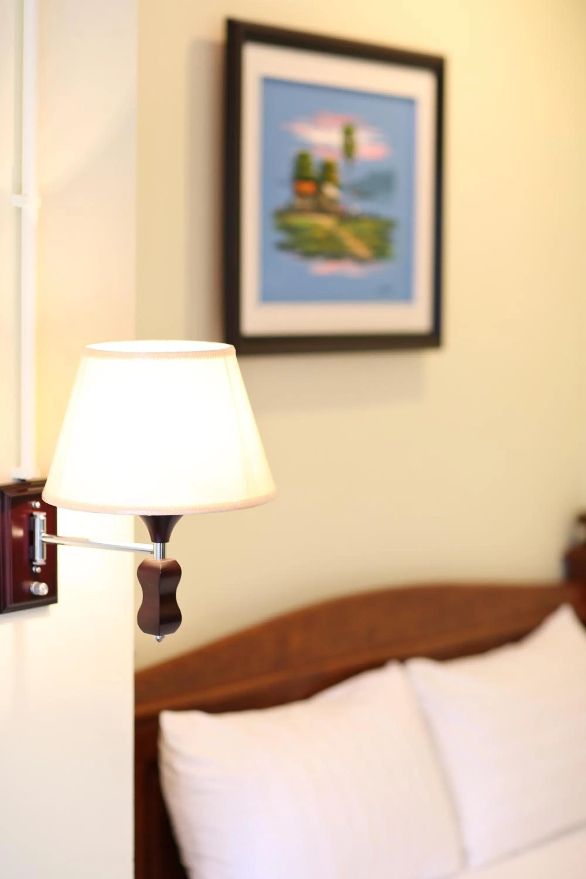 Bed in Golden House International Hotel