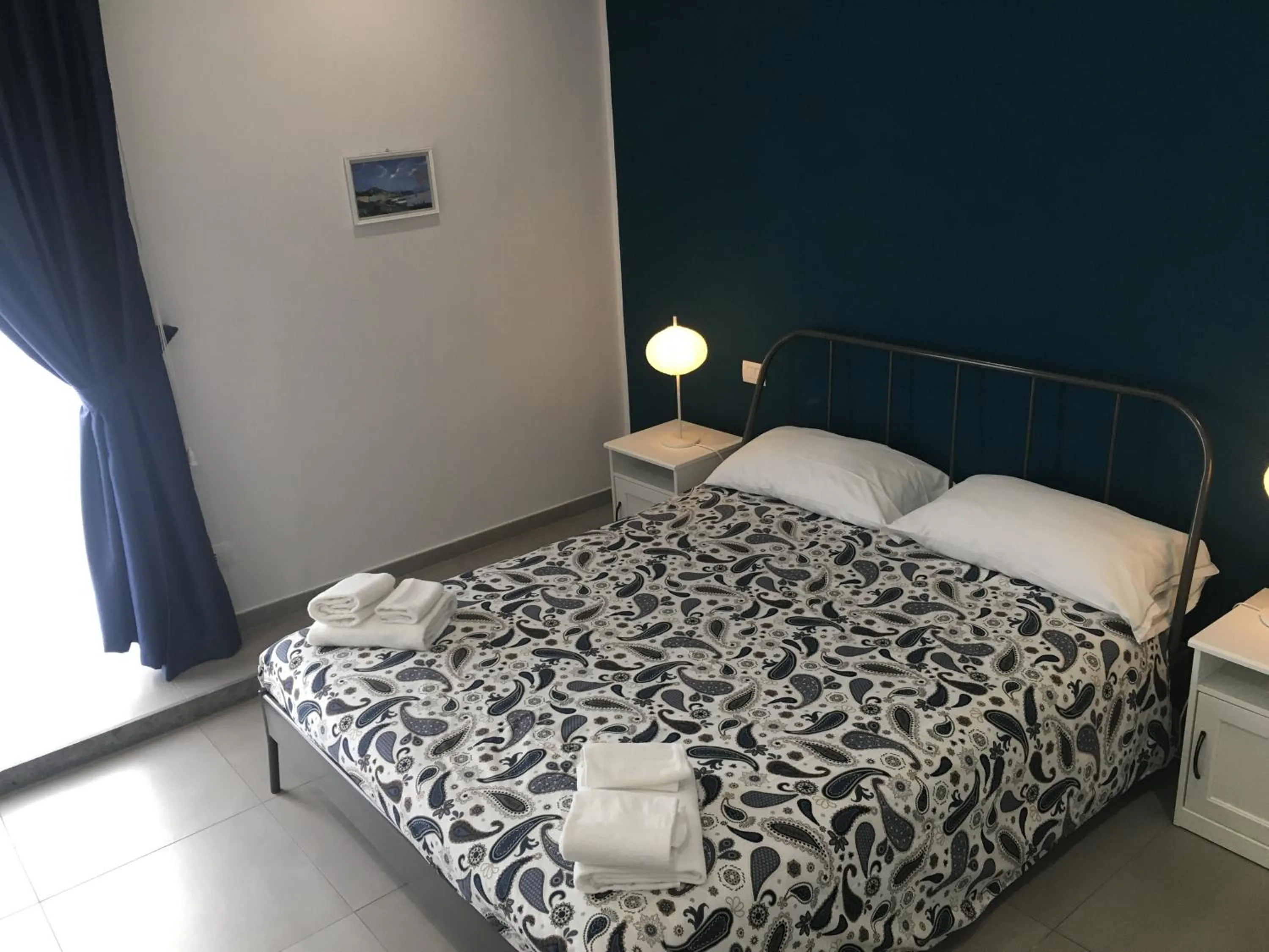 Bed in "Panoramic Terrazza - Napoli"