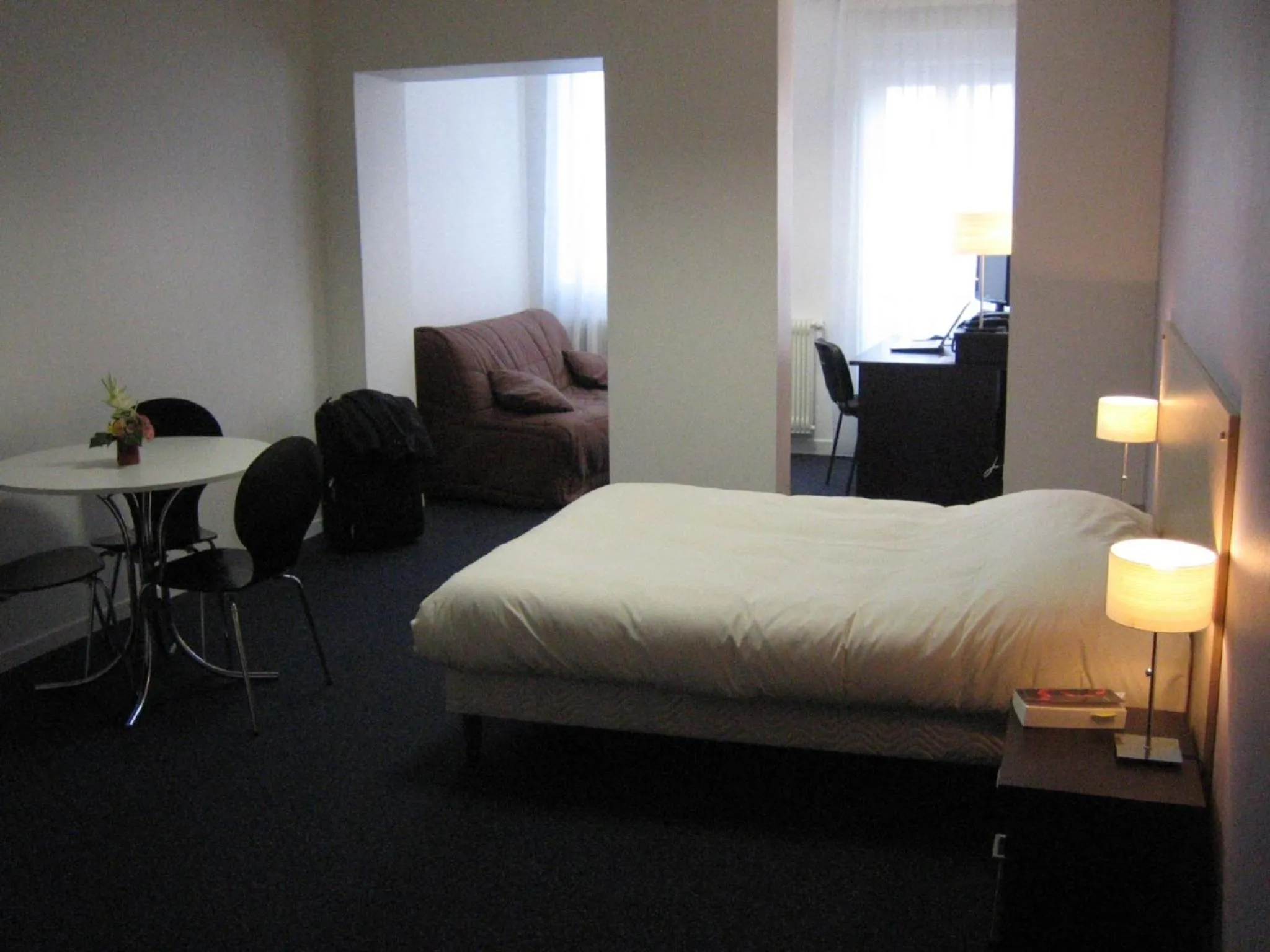 Bedroom, Bed in KOSY Appart'Hôtels - Le Cours Moreau