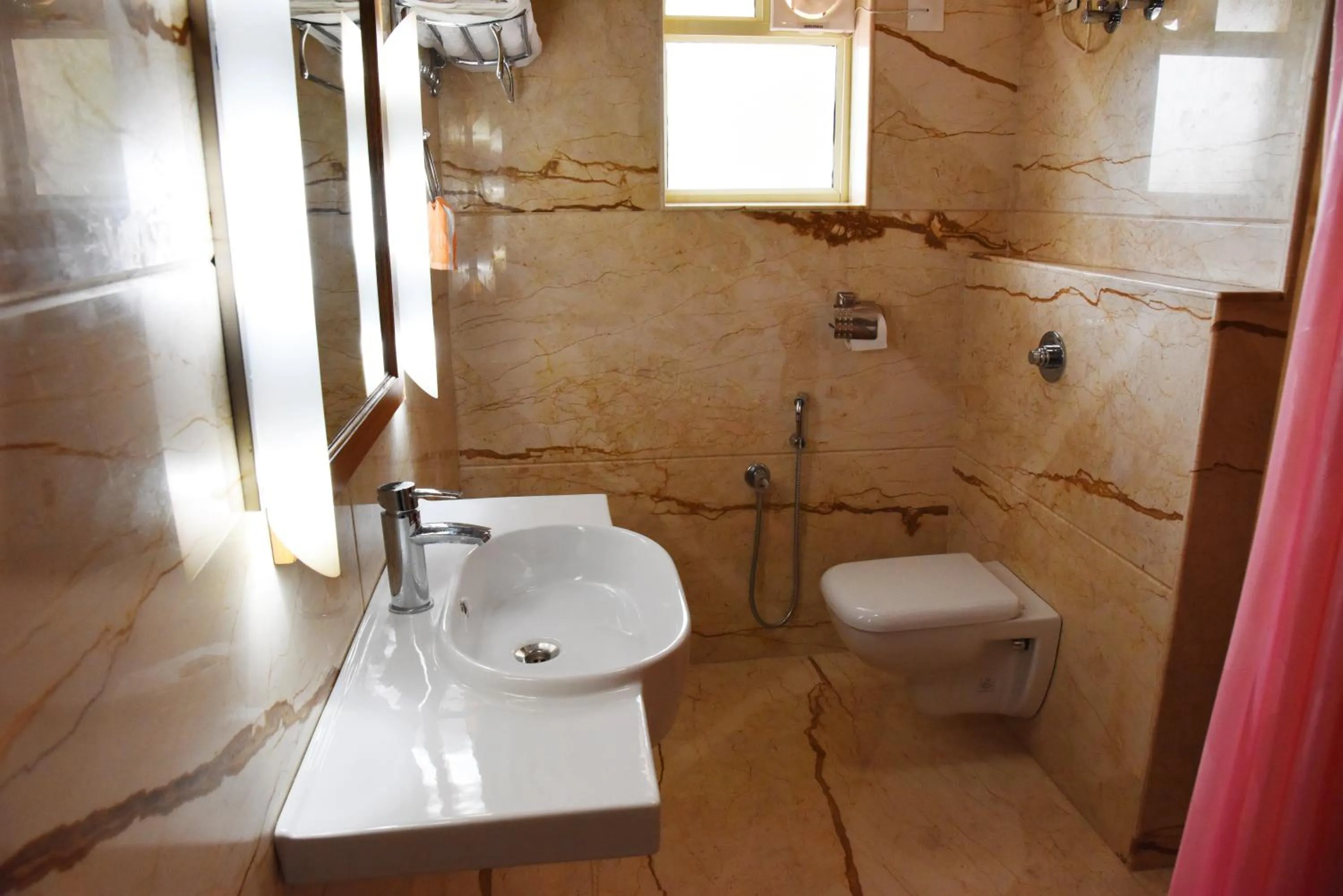 Bathroom in Hotel Sharada International