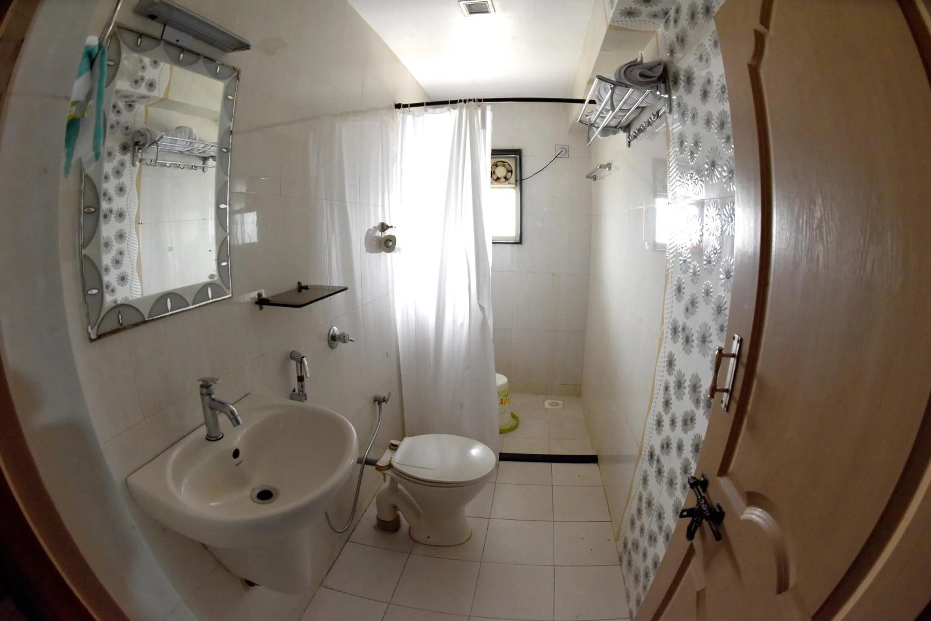 Bathroom in Hotel Sharada International