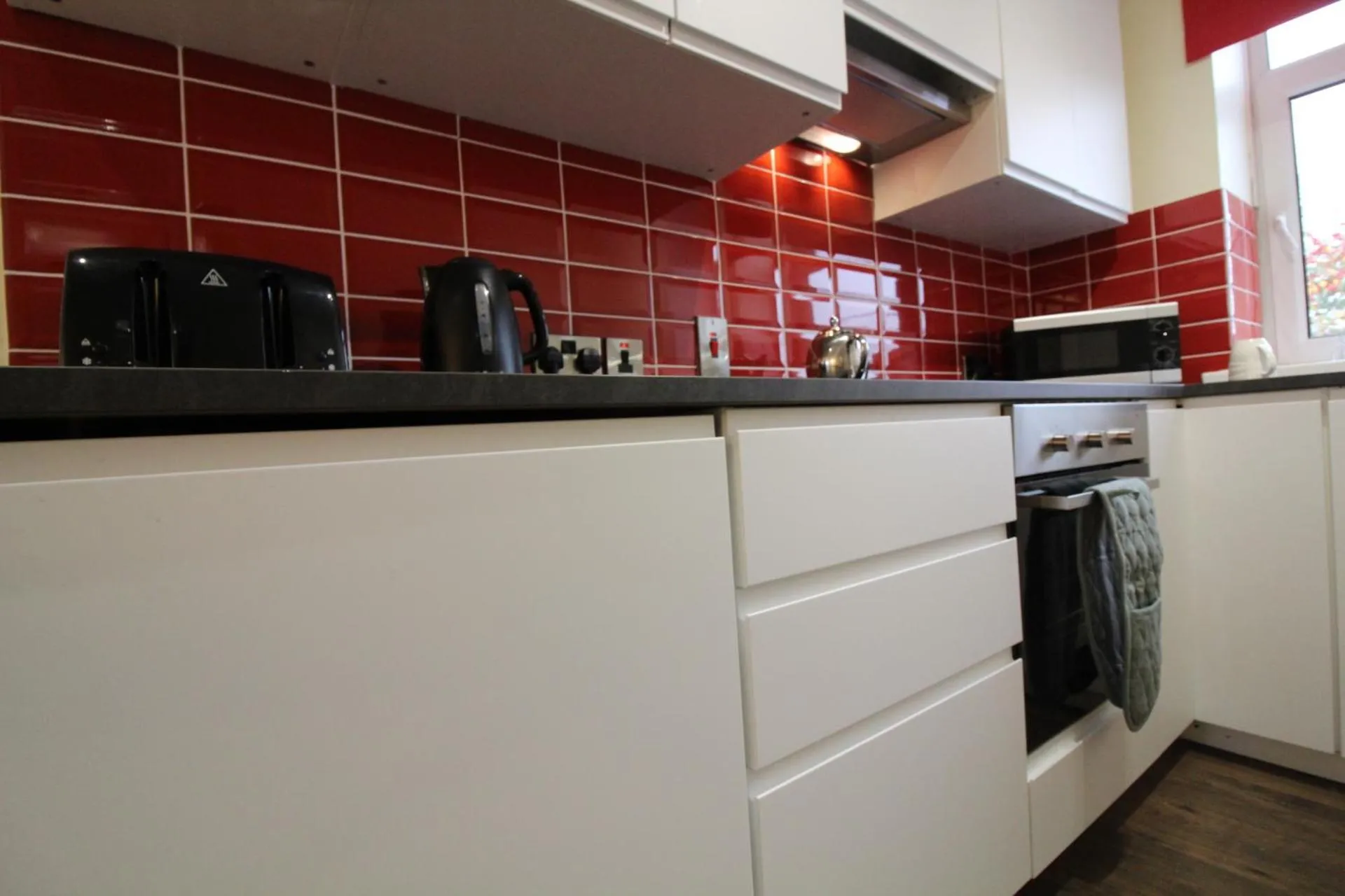 Kitchen or kitchenette in The Little Maryville - City Centre - Parking - 2BR