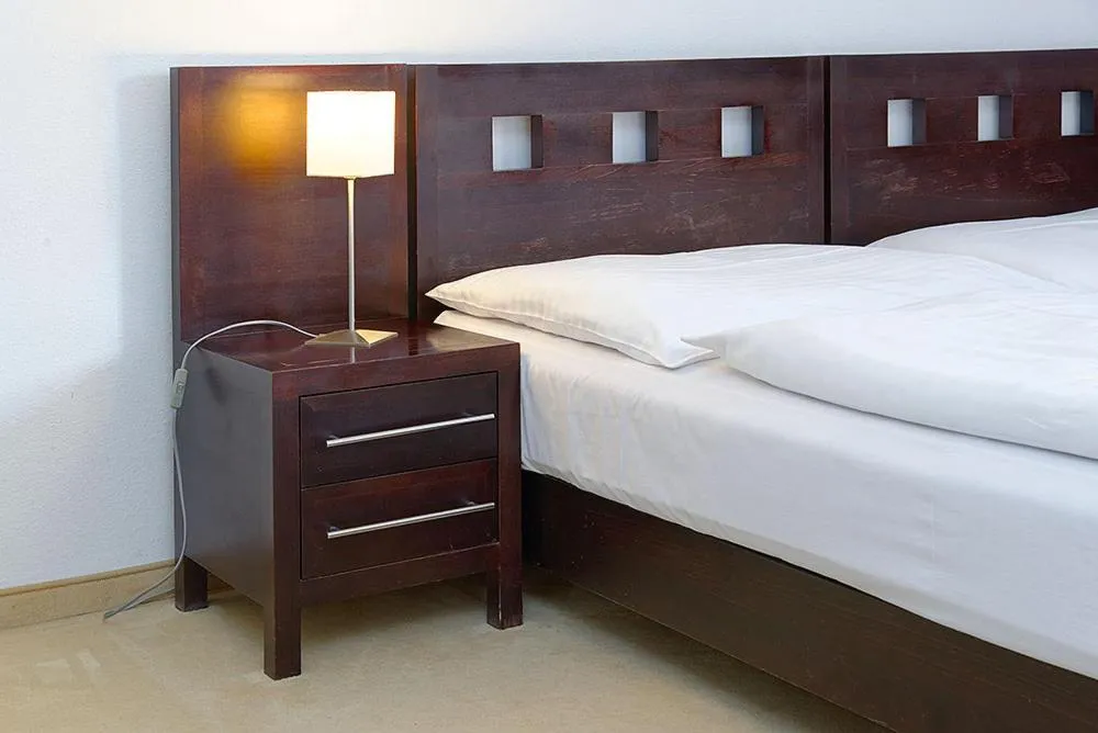 Bed in Hotel Tulipan