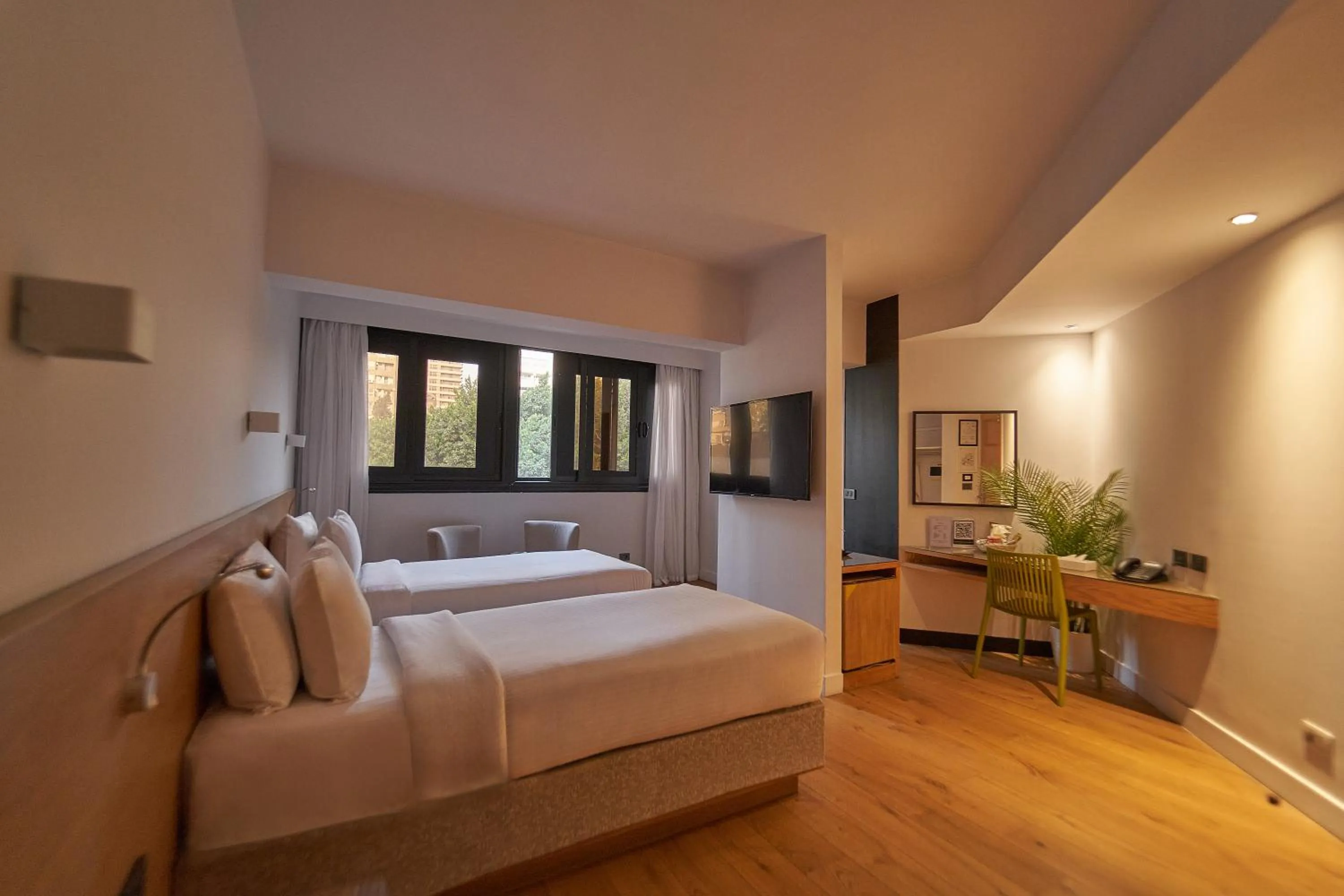 Photo of the whole room, Bed in New President Hotel Cairo