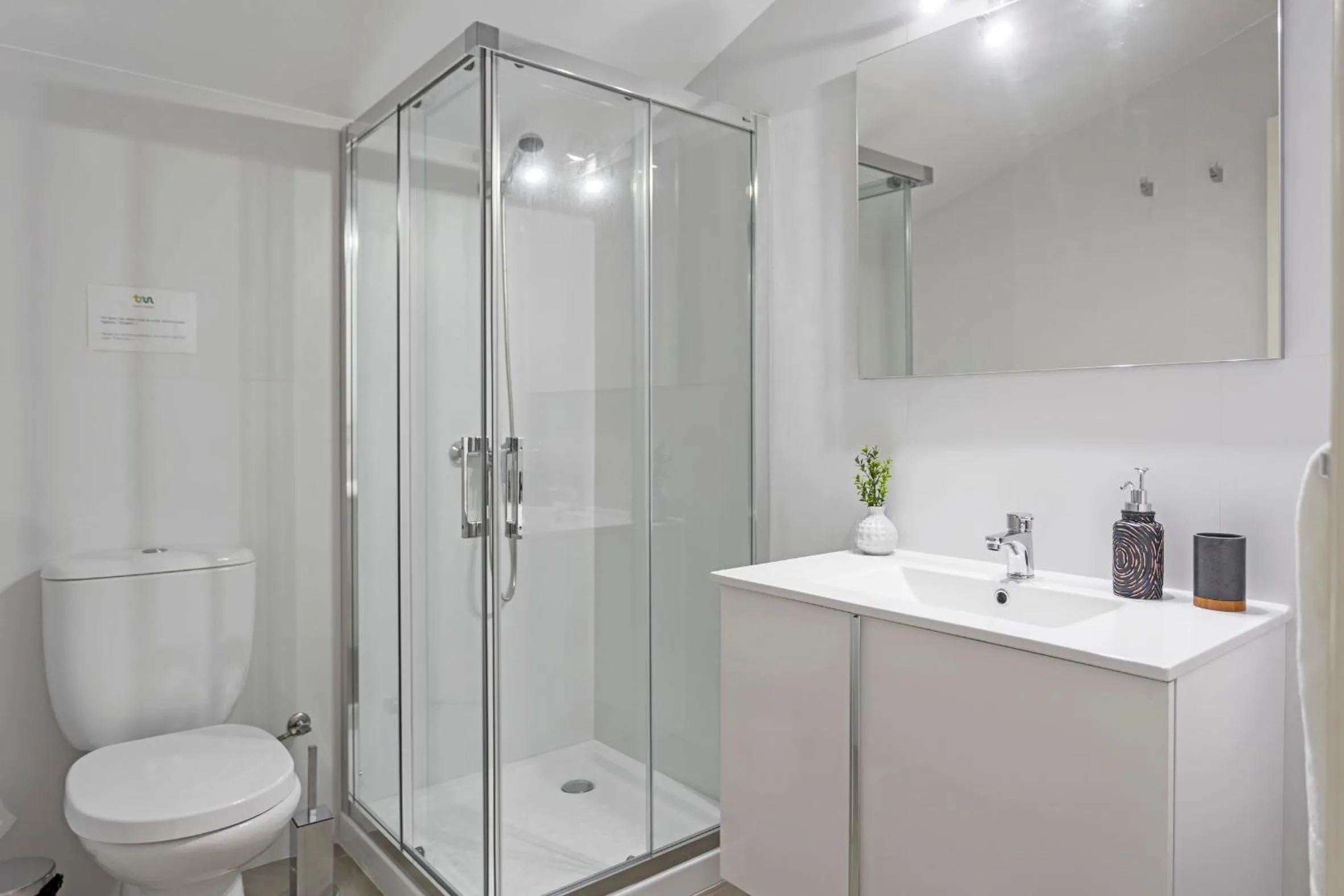Toilet in Vila Eucalipto by An Island Apart