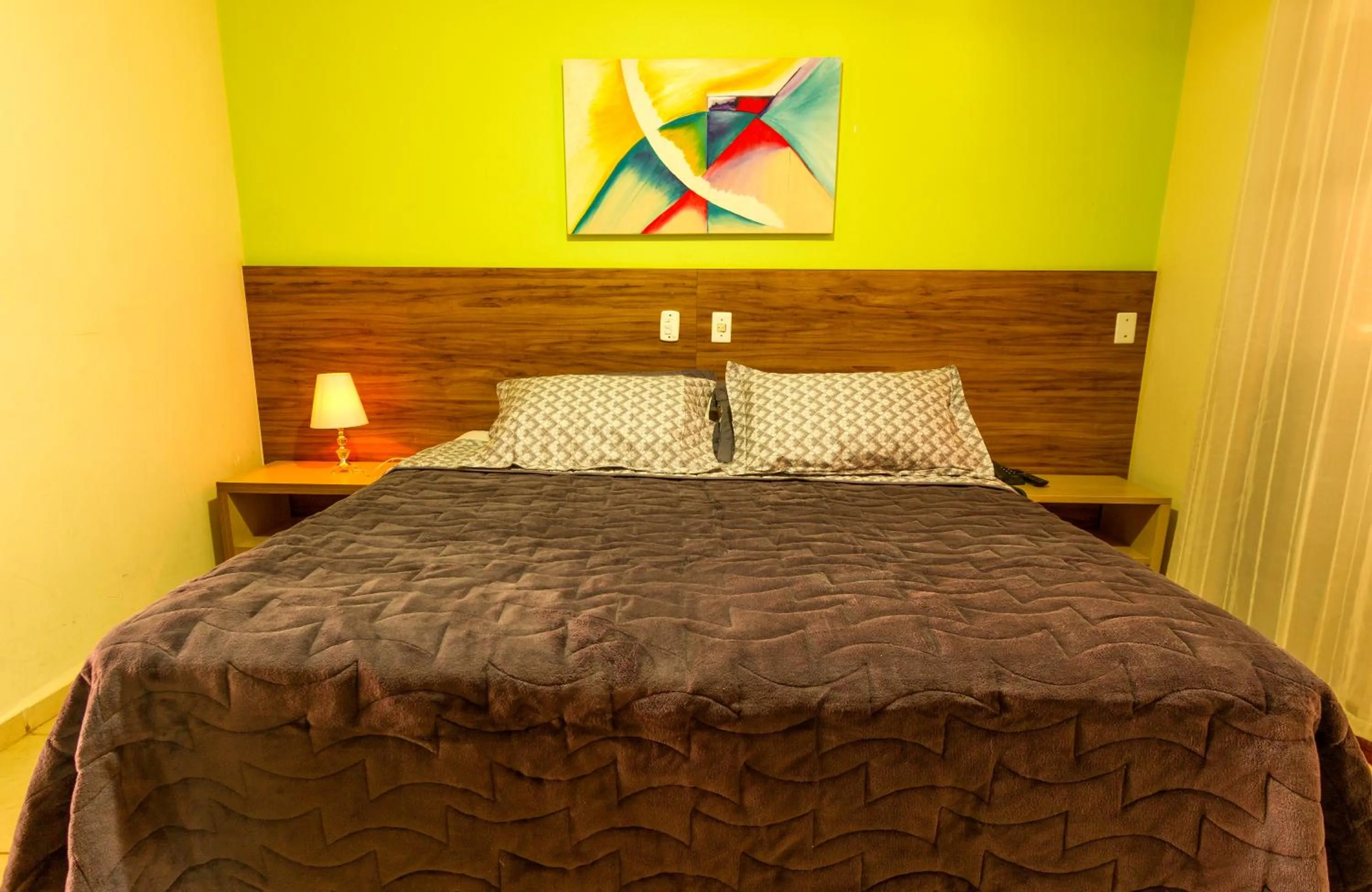 Bed in Pousada Chamamé