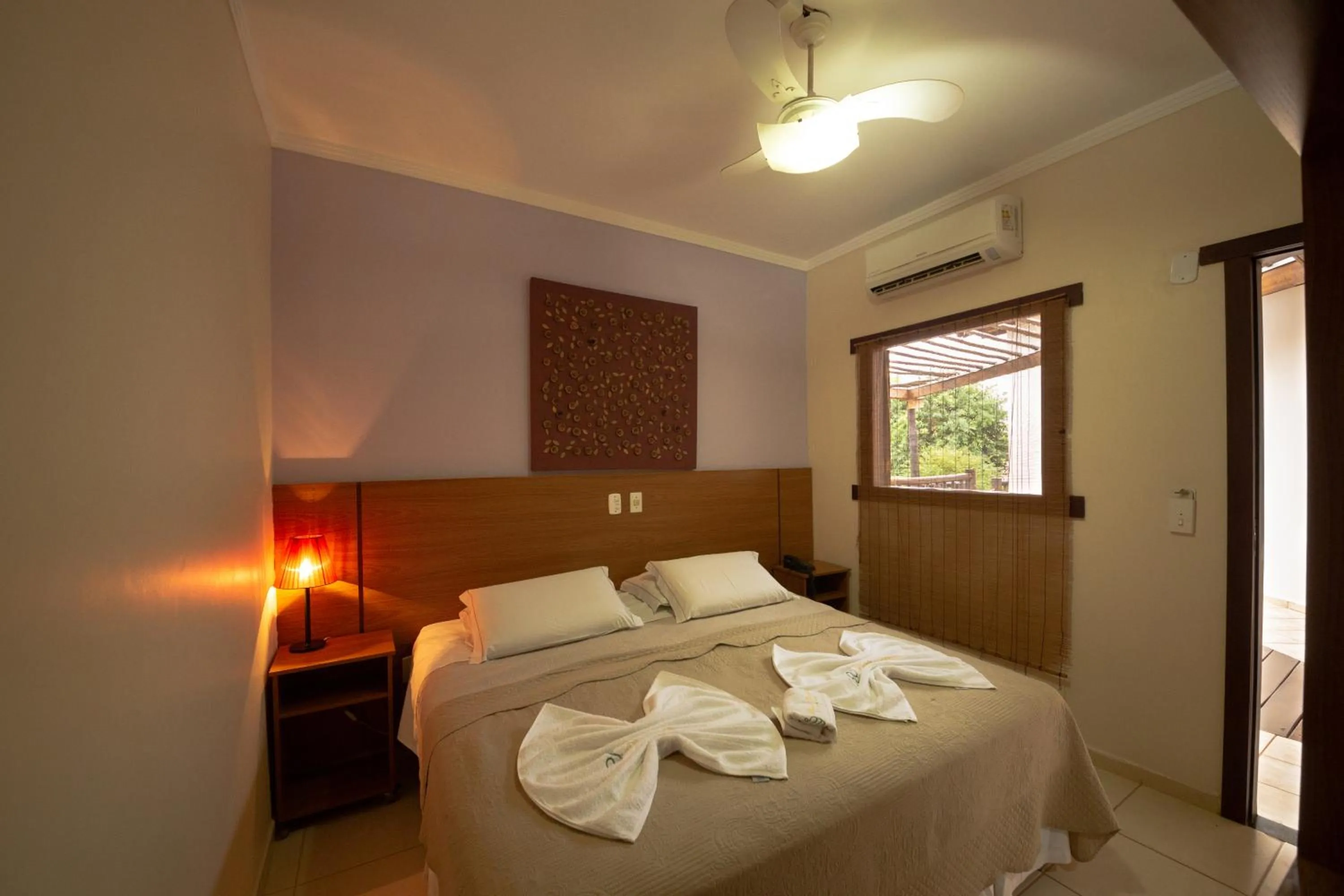 Photo of the whole room, Bed in Pousada Chamamé