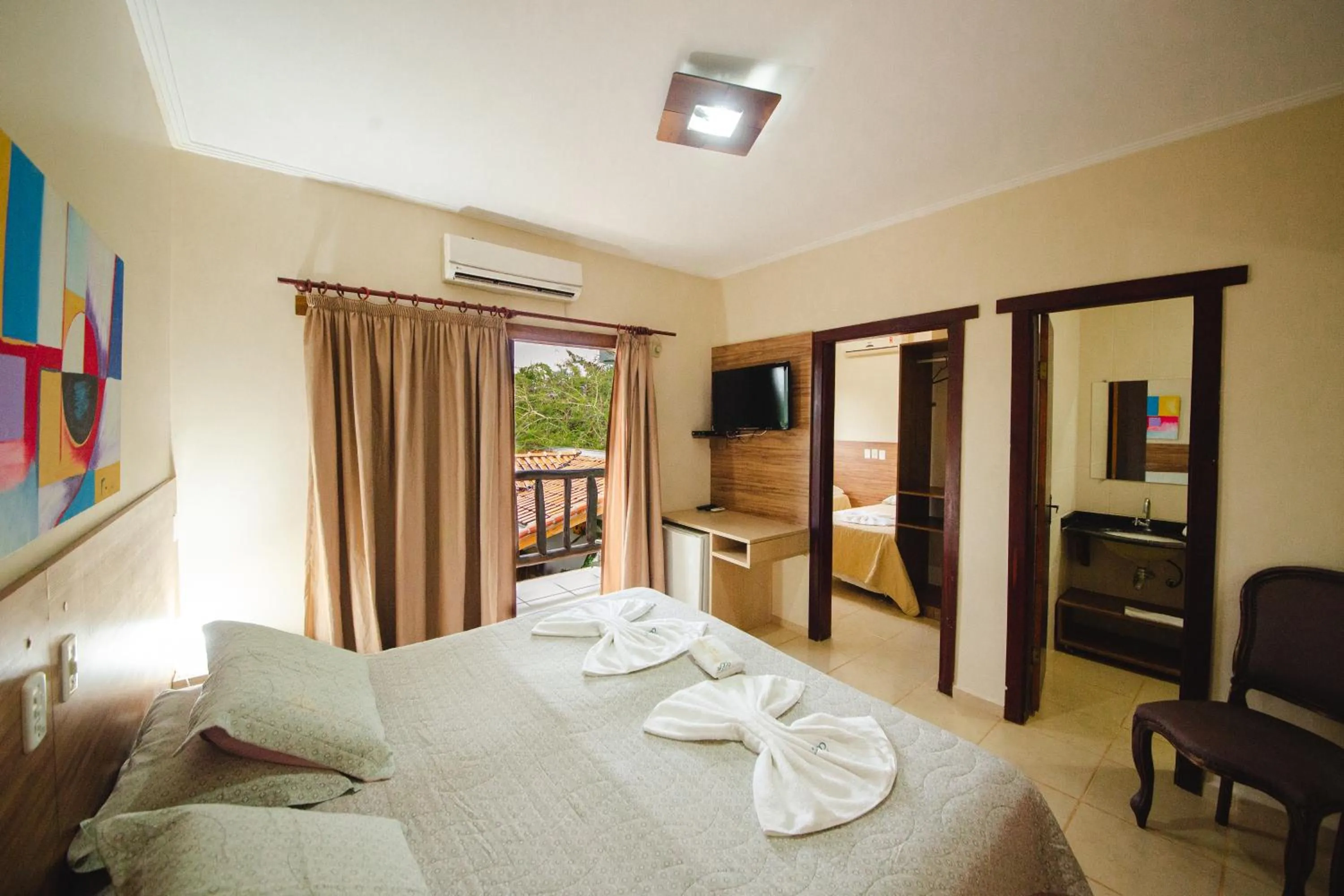 Photo of the whole room, Bed in Pousada Chamamé