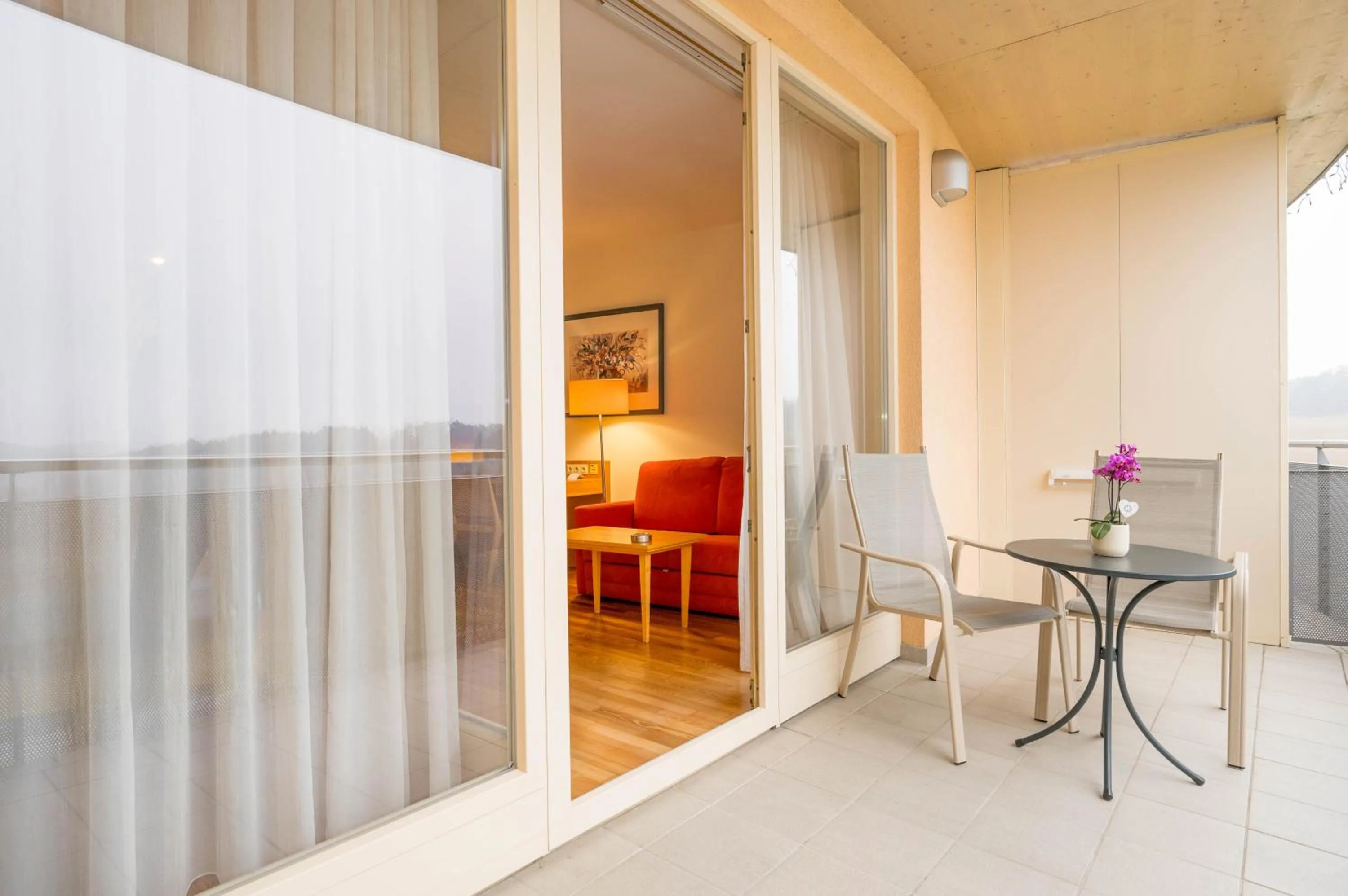 Balcony/Terrace, Bed in Allegria Resort Stegersbach - Allegria Hotel