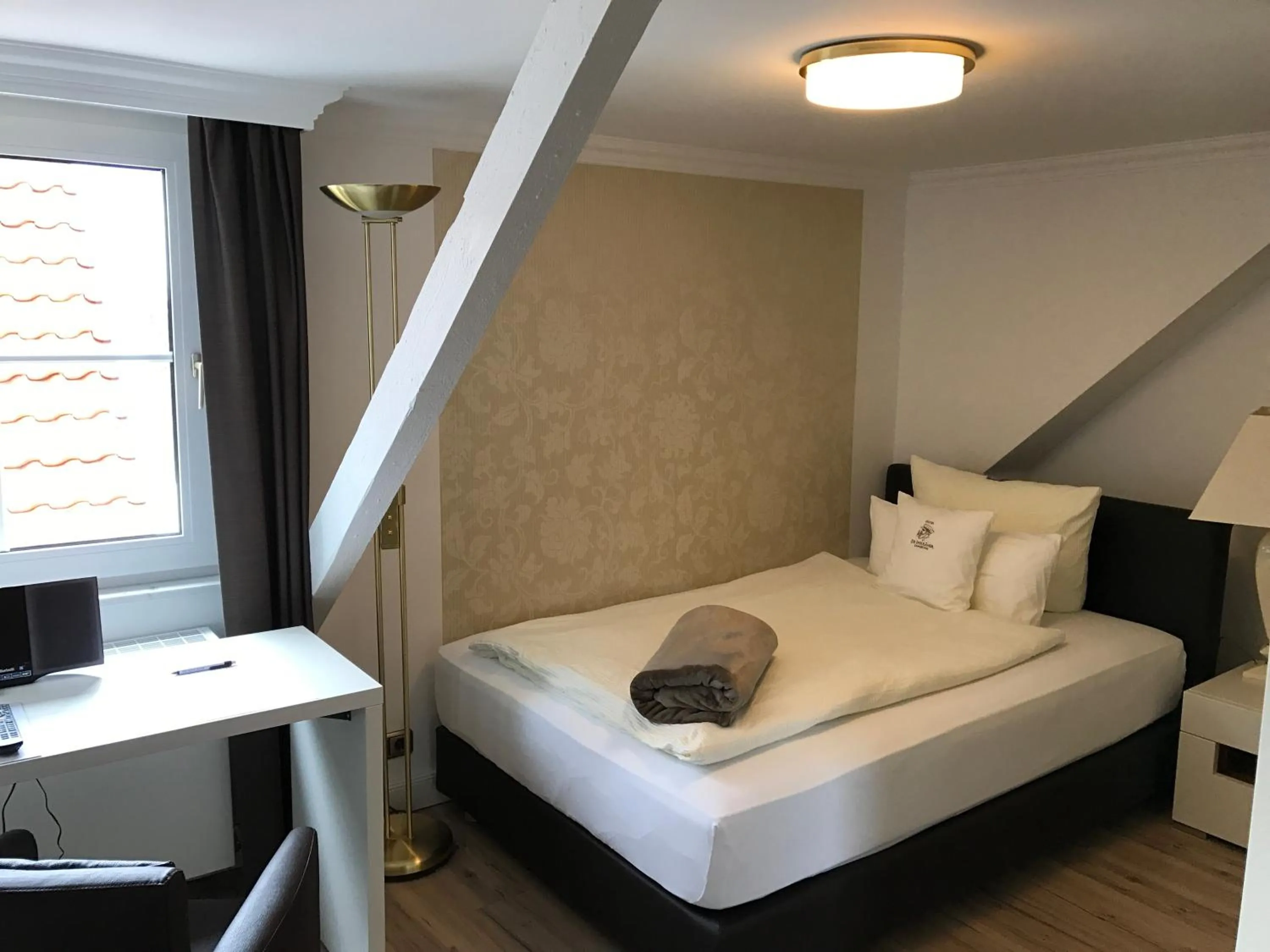 Bed in Hotel De Insulåner