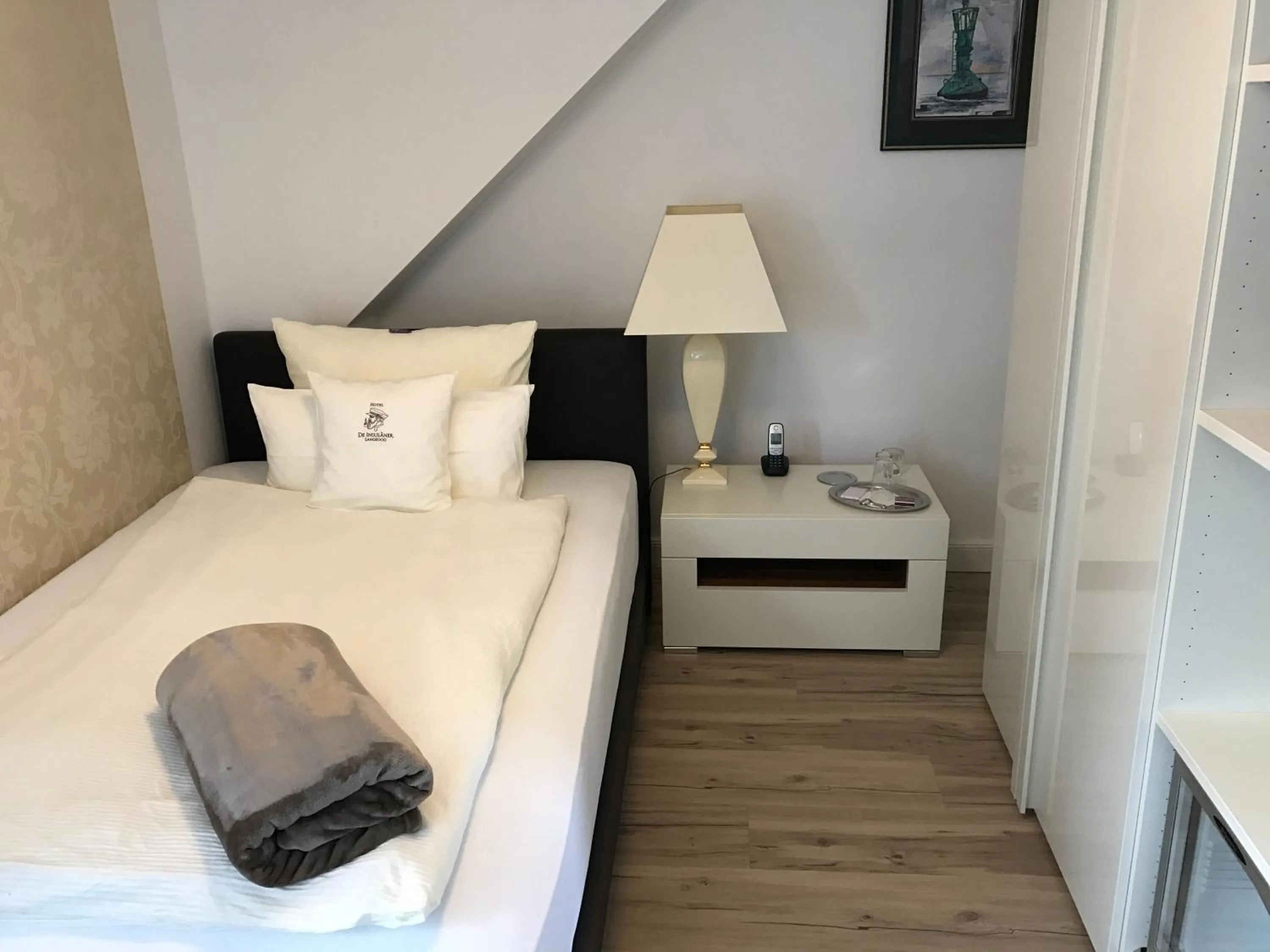 Bed in Hotel De Insulåner