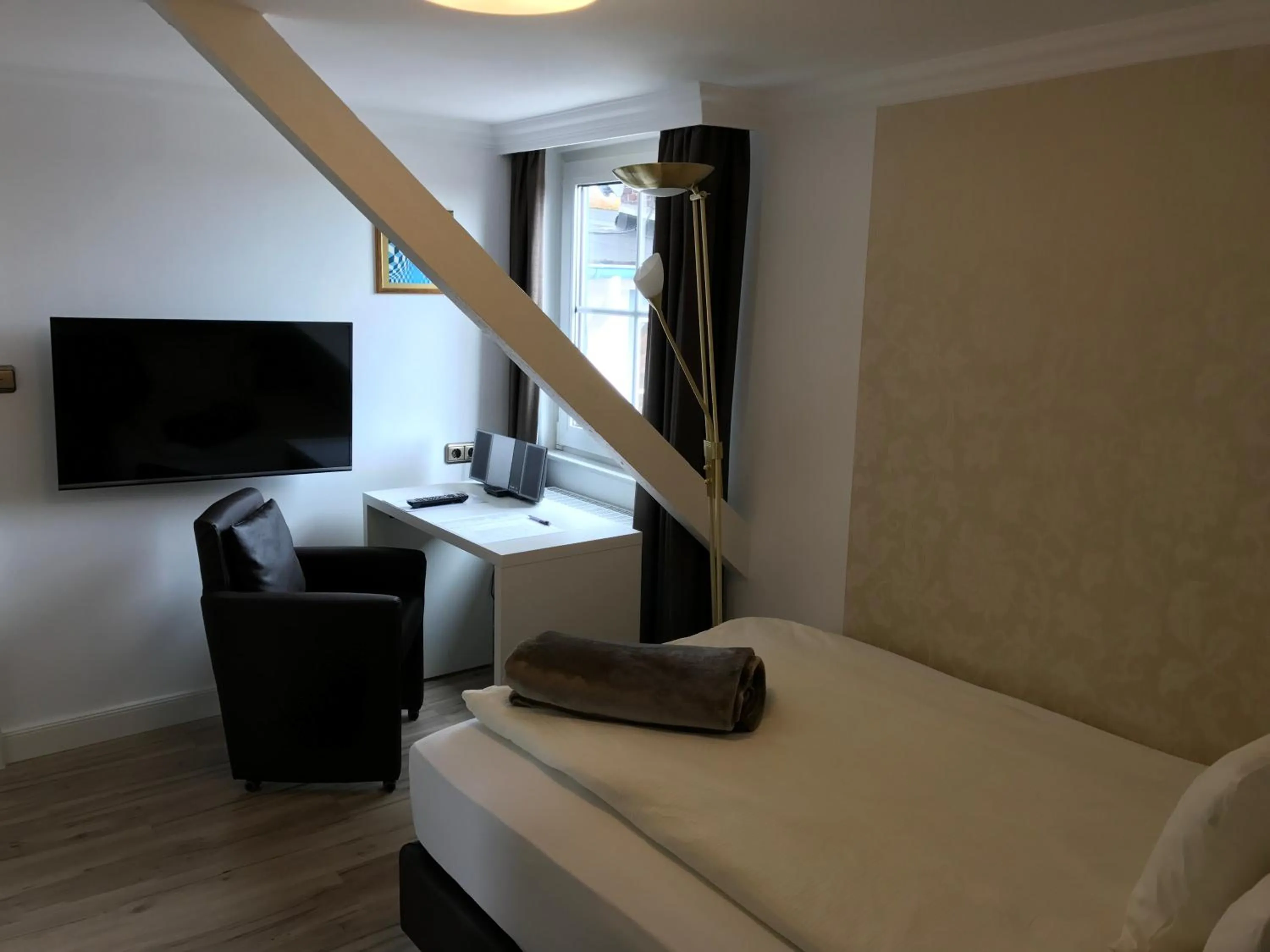 Bed in Hotel De Insulåner