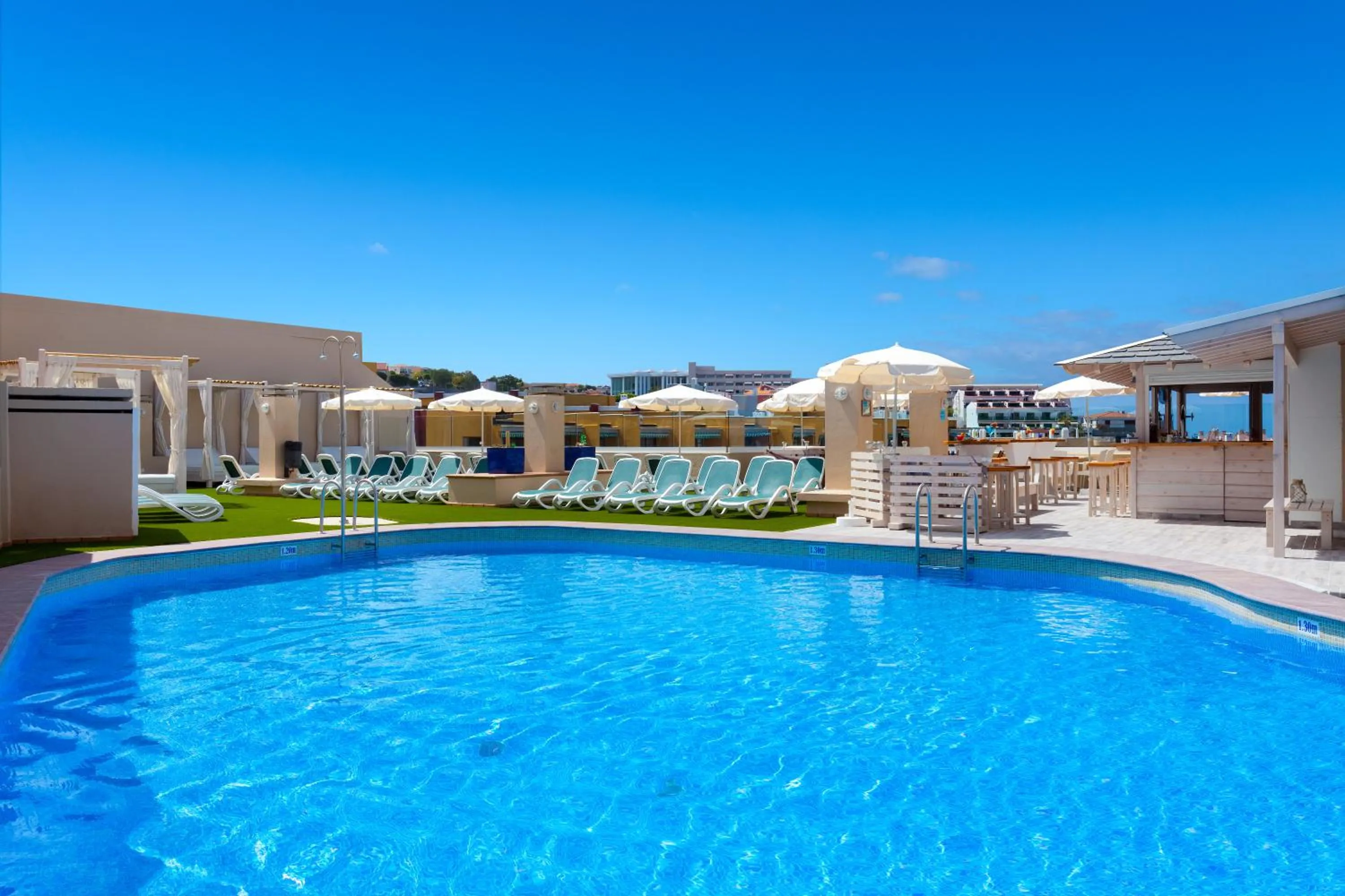 Swimming pool in Aparthotel Los Dragos del Sur