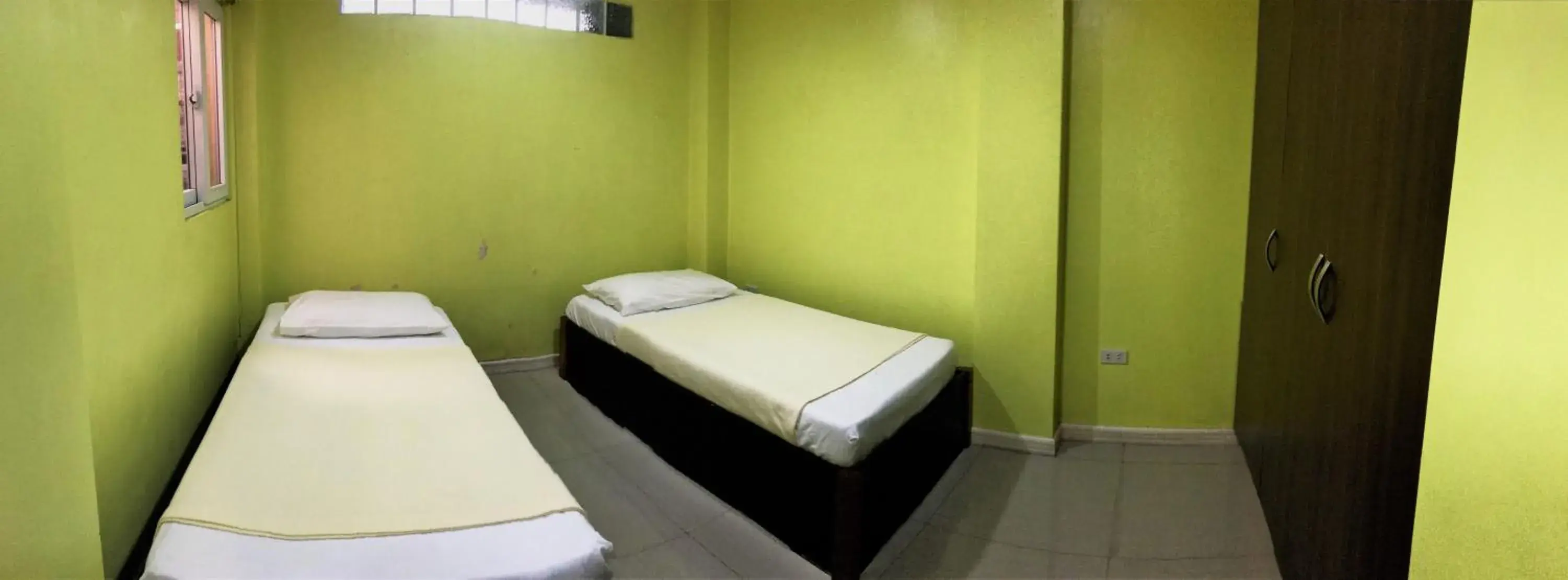 Bed in RL Veranda Suite Bed in RL Veranda Suite