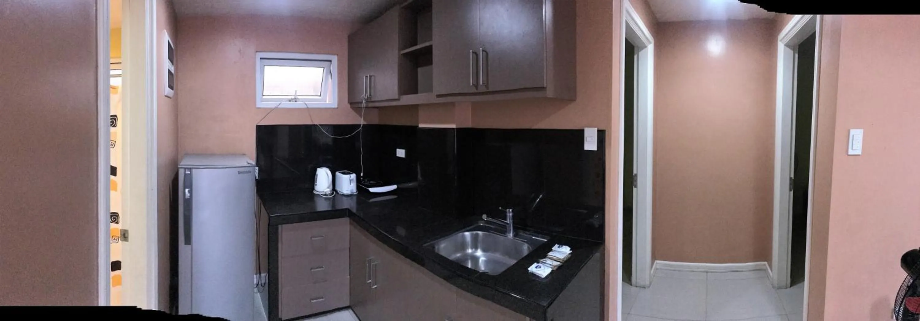 Kitchen or kitchenette in RL Veranda Suite