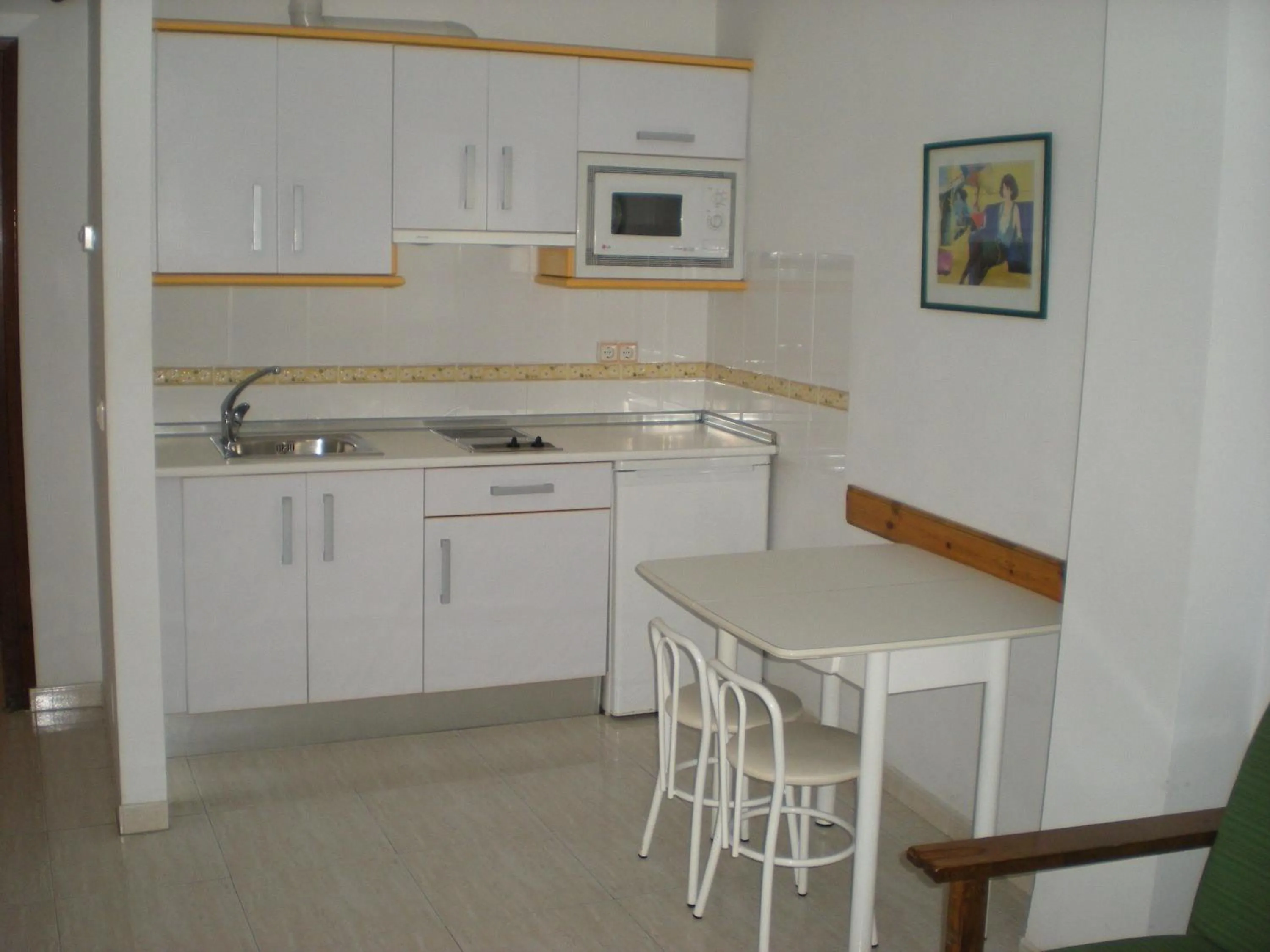 Kitchen or kitchenette in Apartamentos Casanova