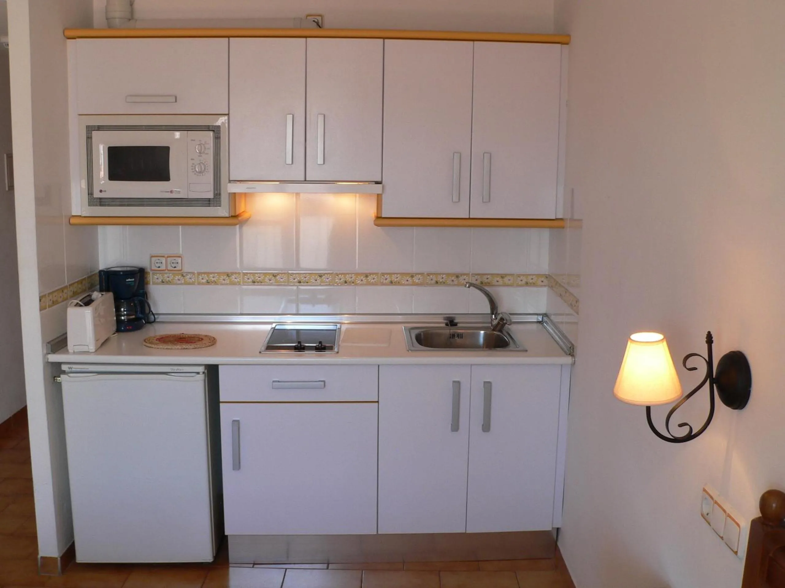 Kitchen or kitchenette in Apartamentos Casanova