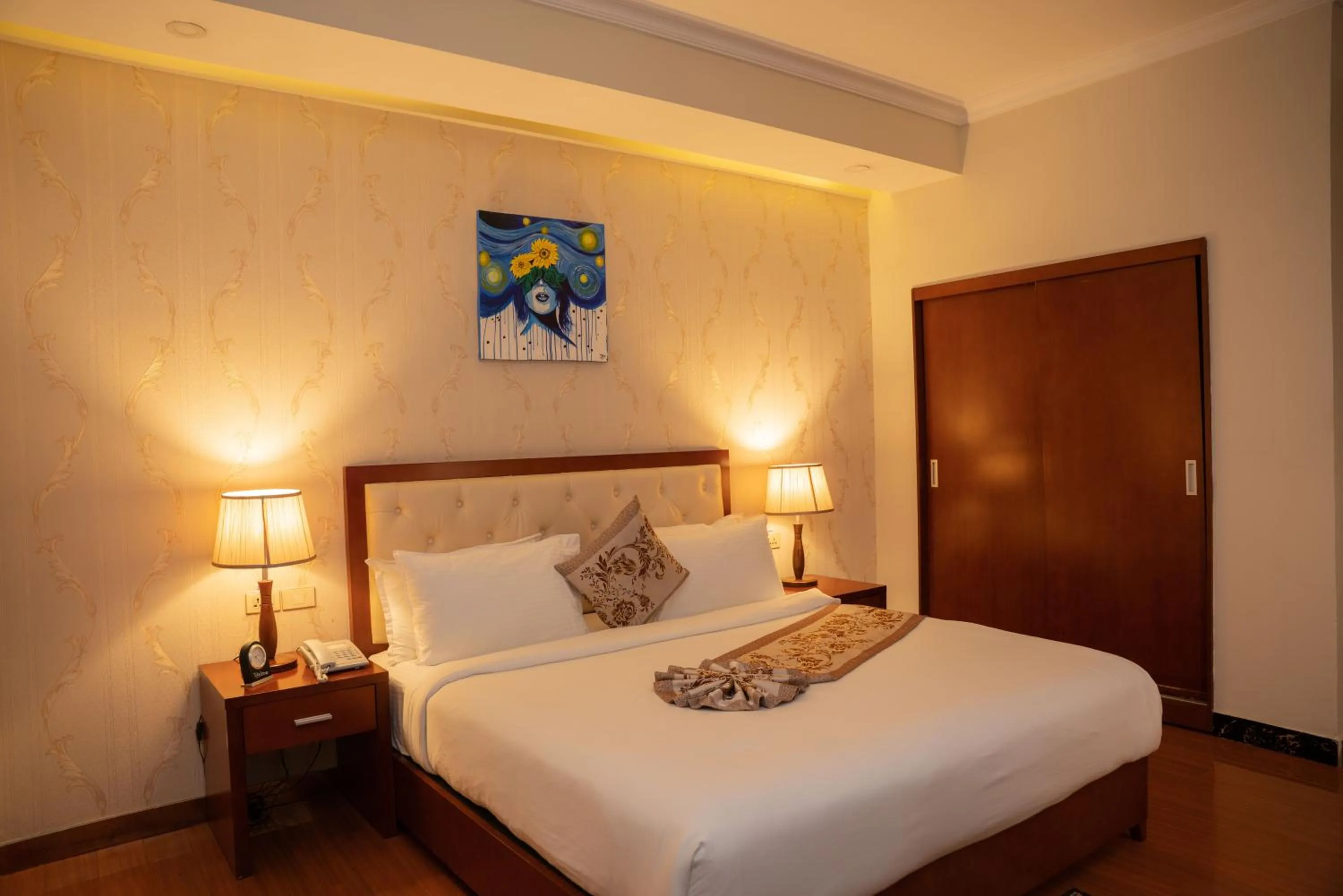 Bed in Tolip Olympia Hotel