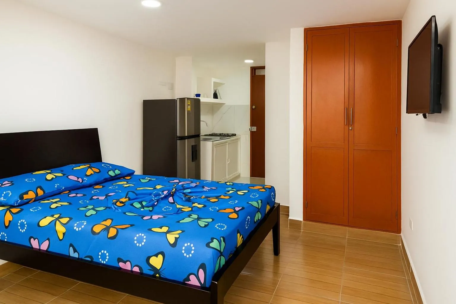 TV and multimedia, Bed in El Velero Apartamentos By DANP