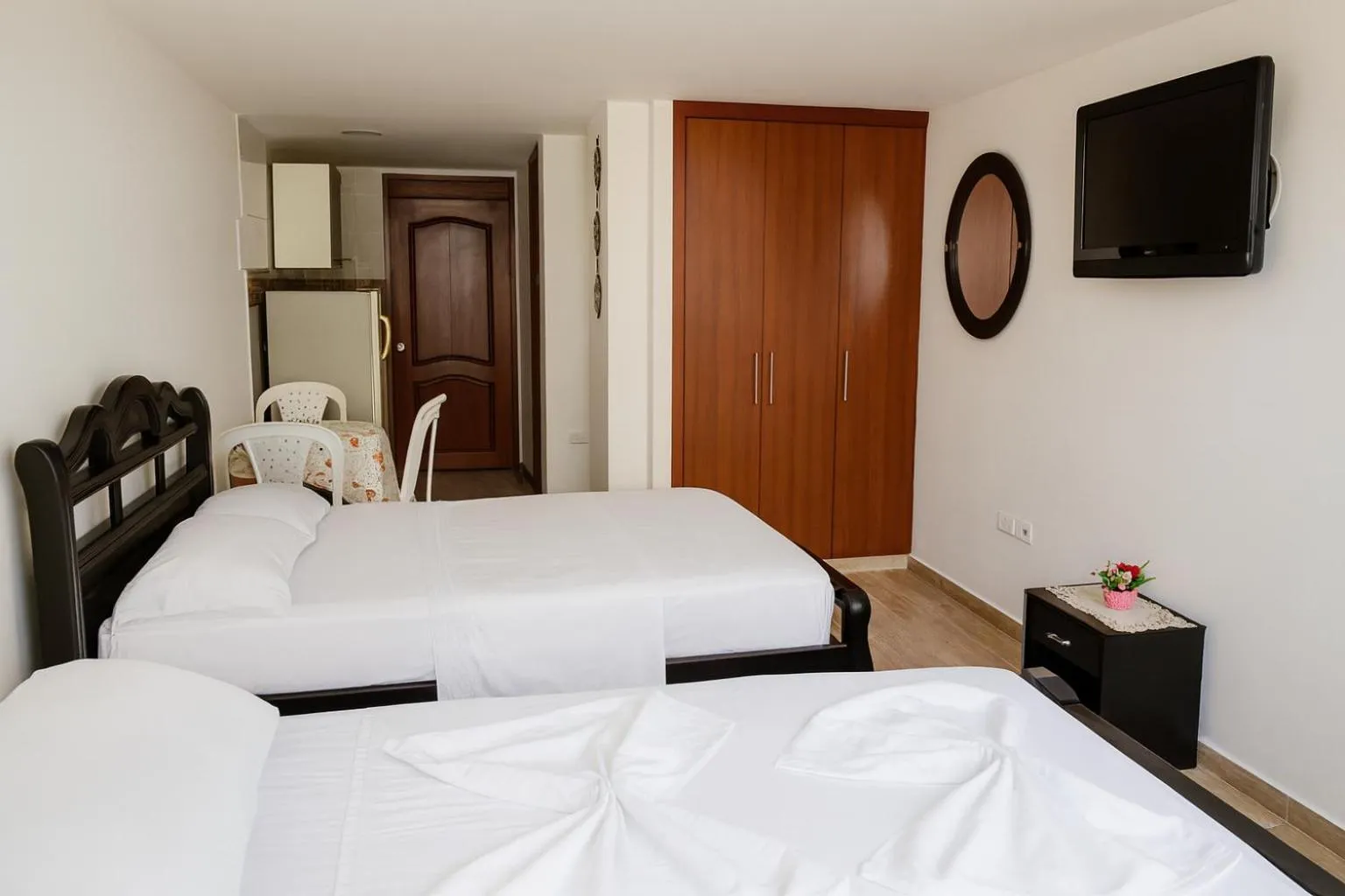 TV and multimedia, Bed in El Velero Apartamentos By DANP
