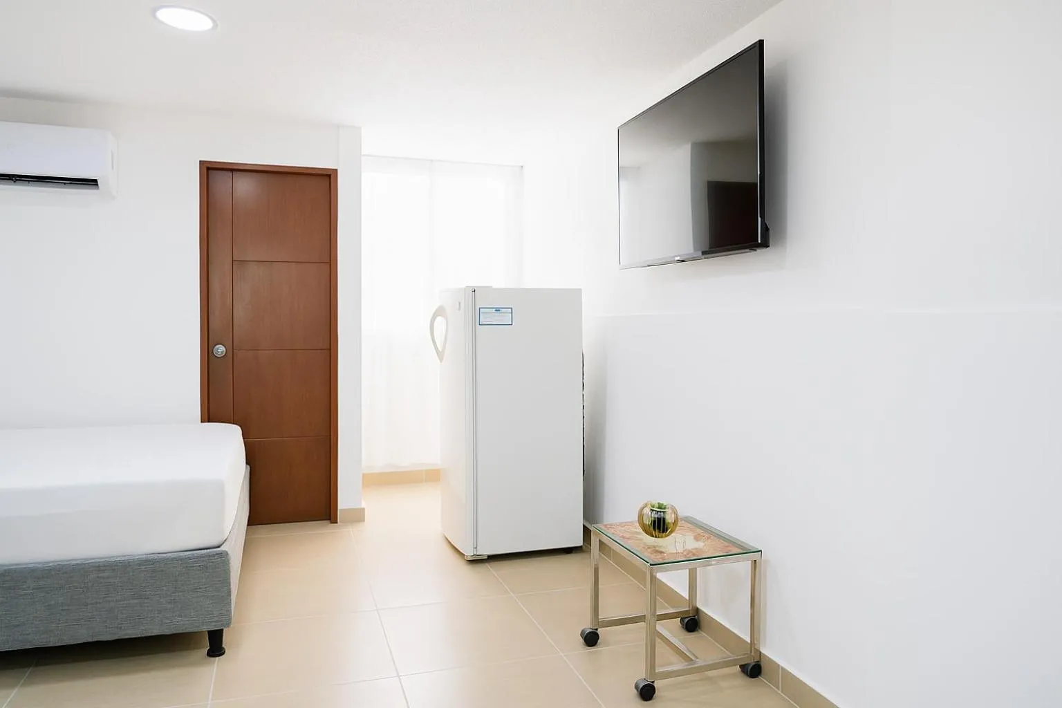 TV and multimedia, Bed in El Velero Apartamentos By DANP