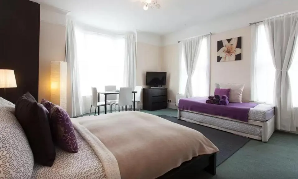 Bed in Home2Home-Rooms