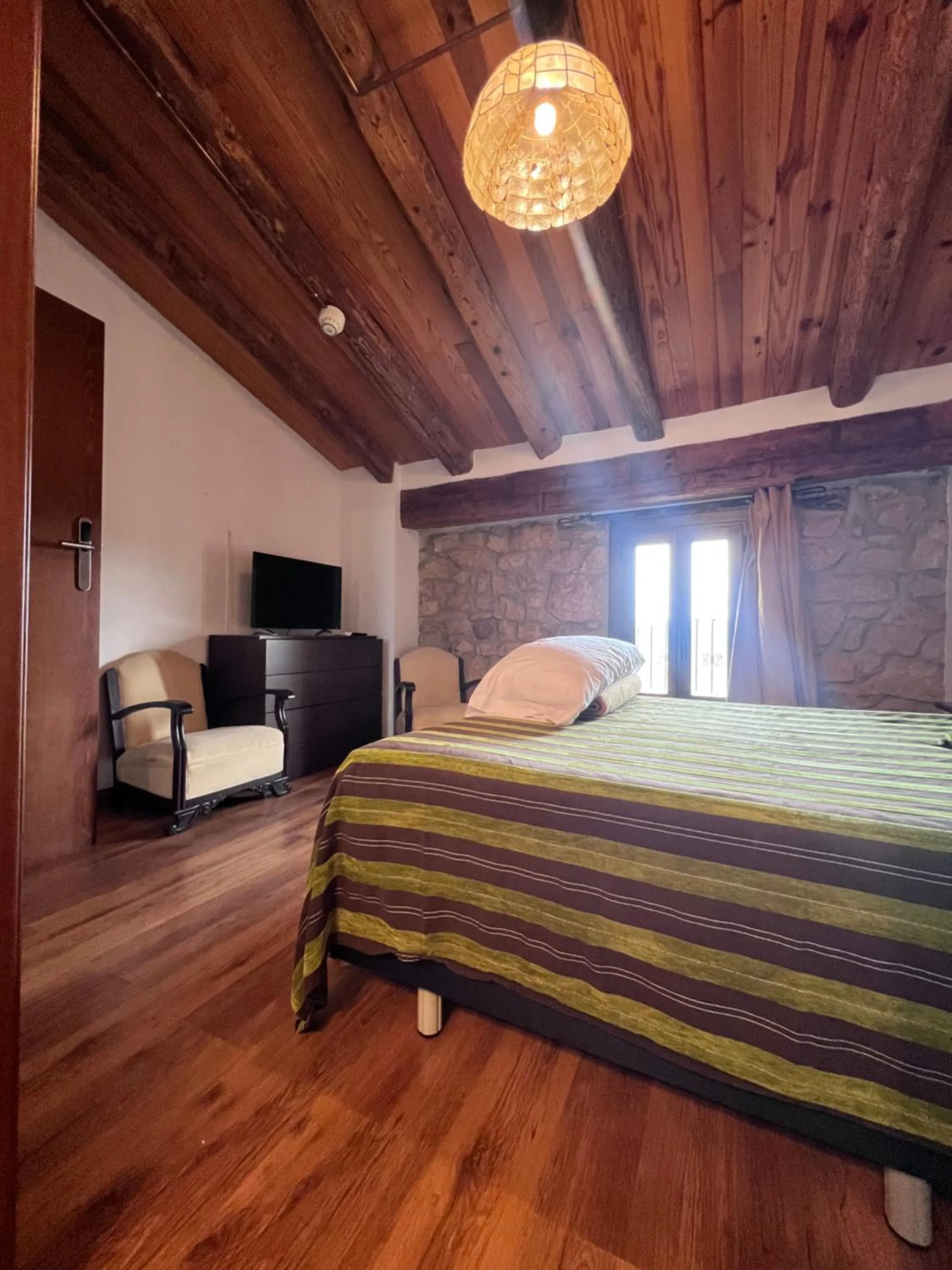 Bed in La Garbinada Hotel