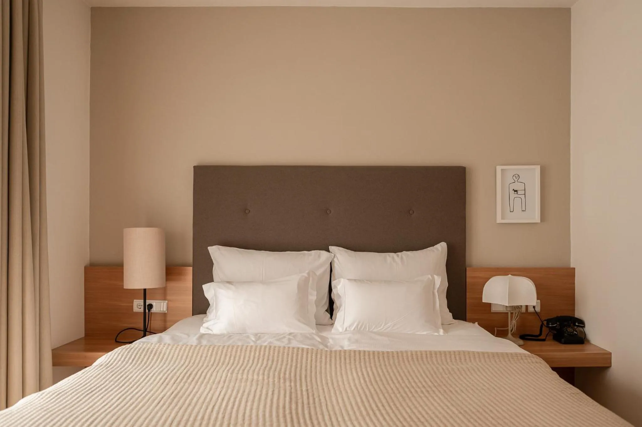 Bed in Hotel Schwarzschmied, a Member of Design Hotels
