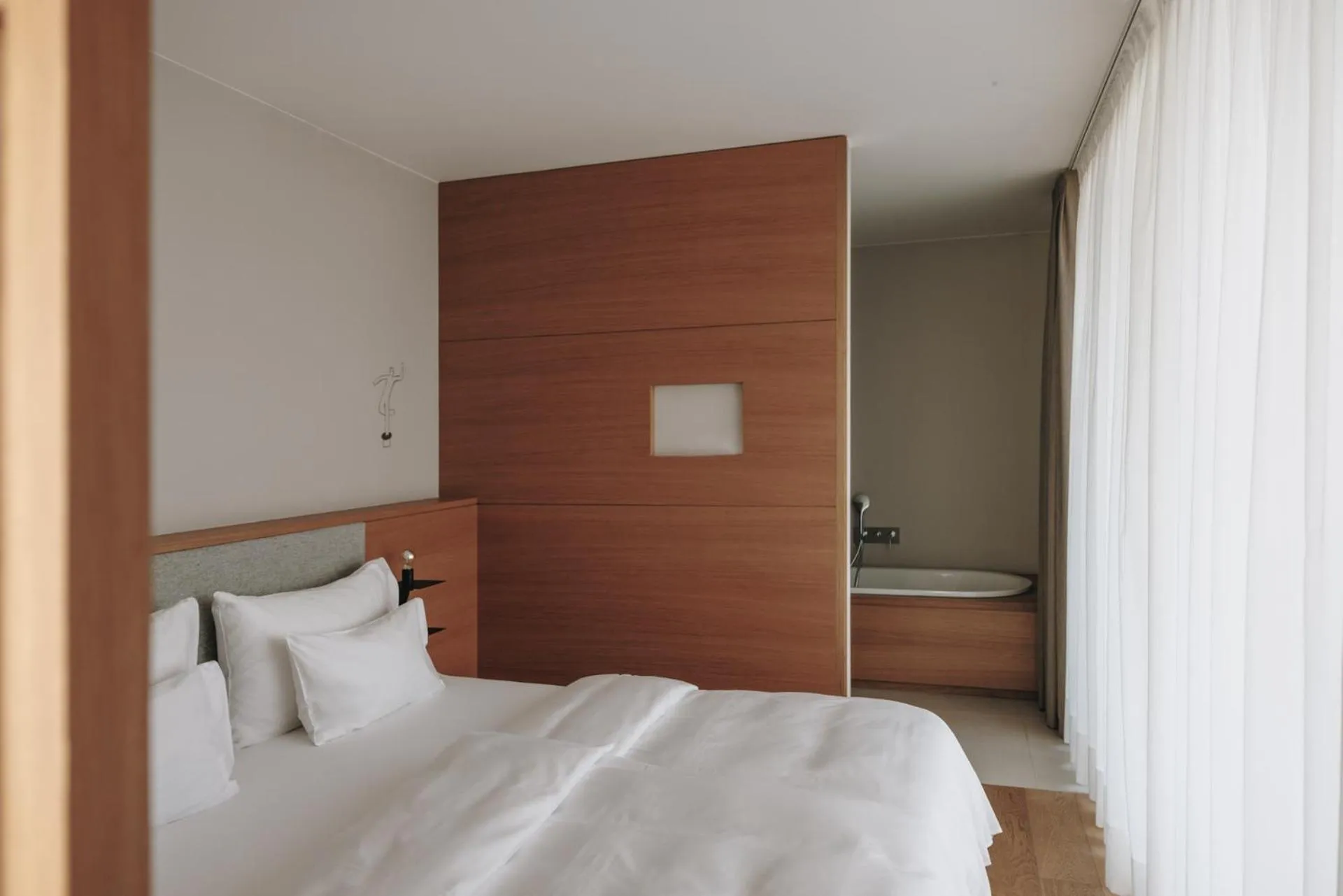 Bed in Hotel Schwarzschmied, a Member of Design Hotels