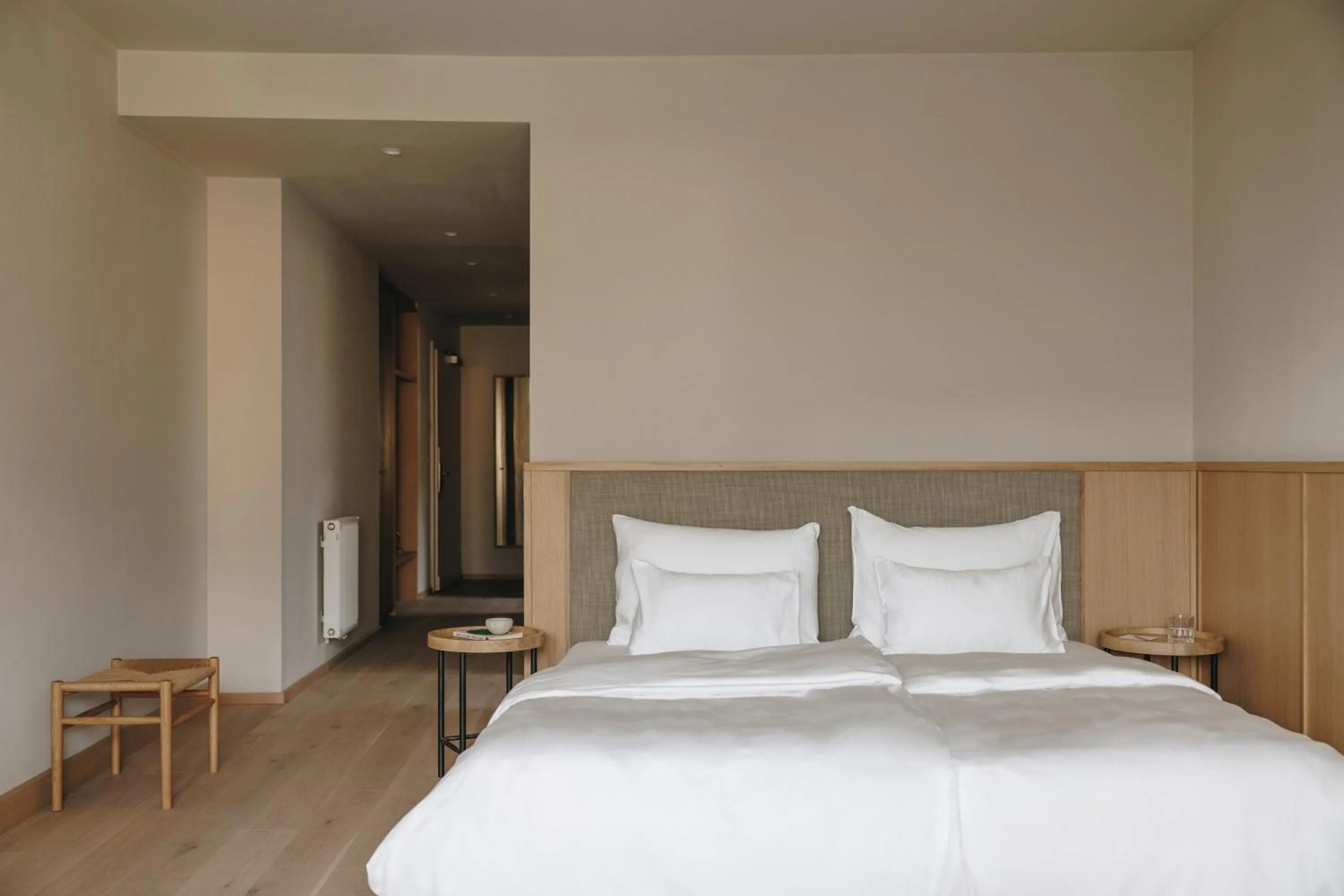 Bed in Hotel Schwarzschmied, a Member of Design Hotels