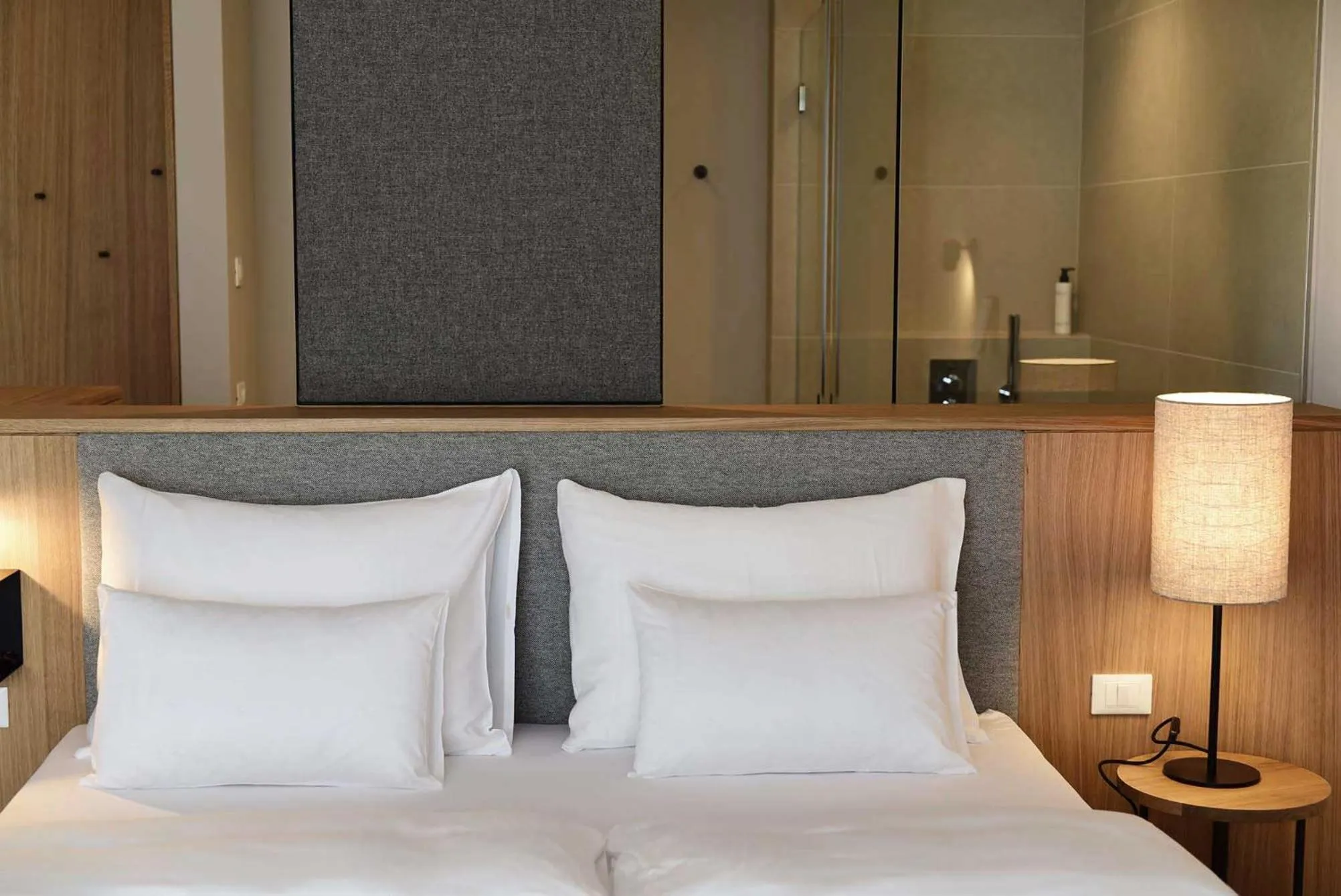 Bed in Hotel Schwarzschmied, a Member of Design Hotels