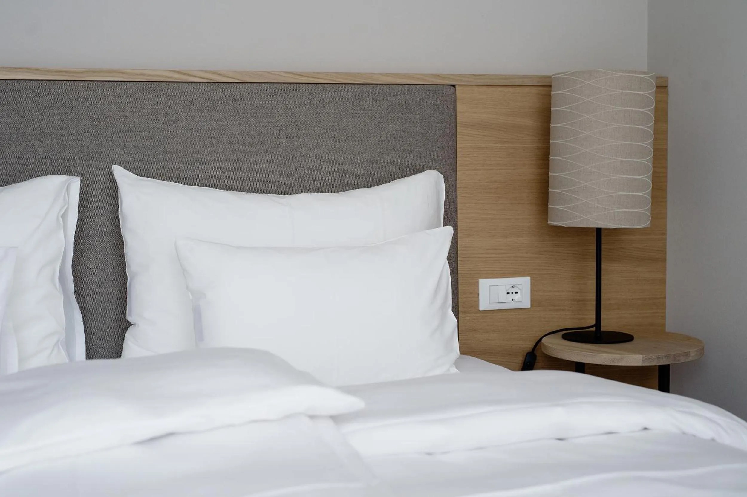 Bed in Hotel Schwarzschmied, a Member of Design Hotels