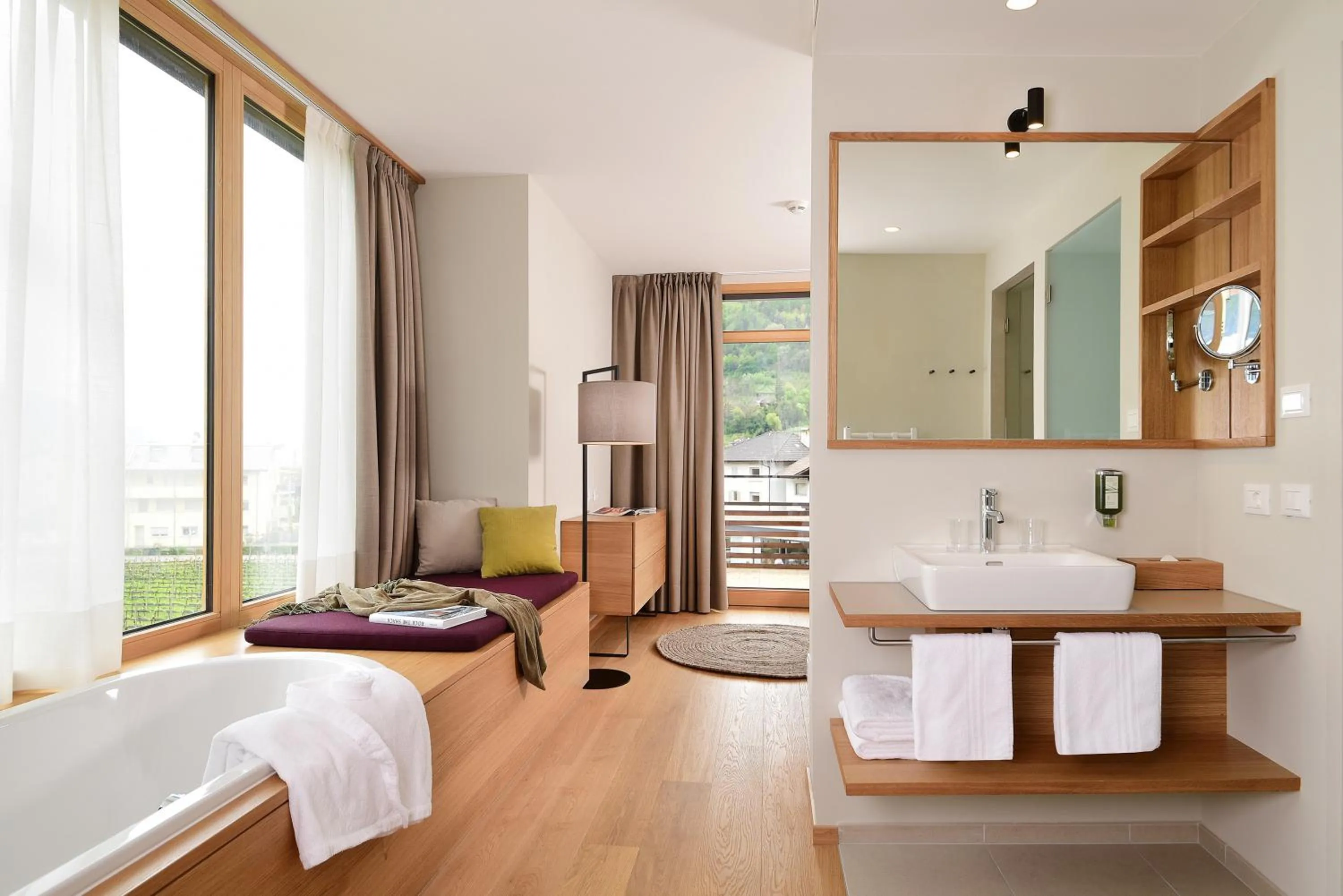 Bathroom, Bed in Hotel Schwarzschmied, a Member of Design Hotels