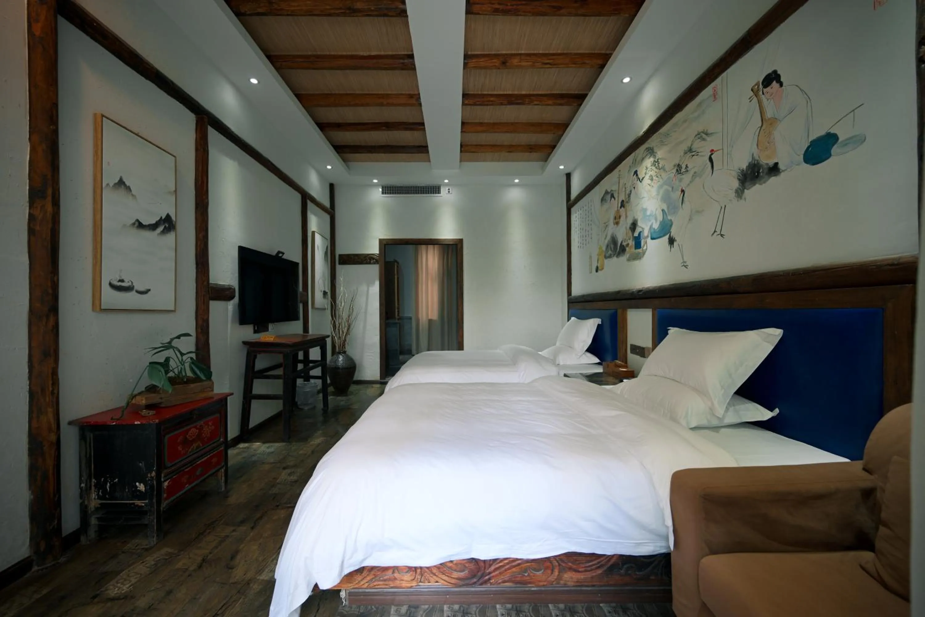 Bed in Old Story Inn Lijiang Old Town