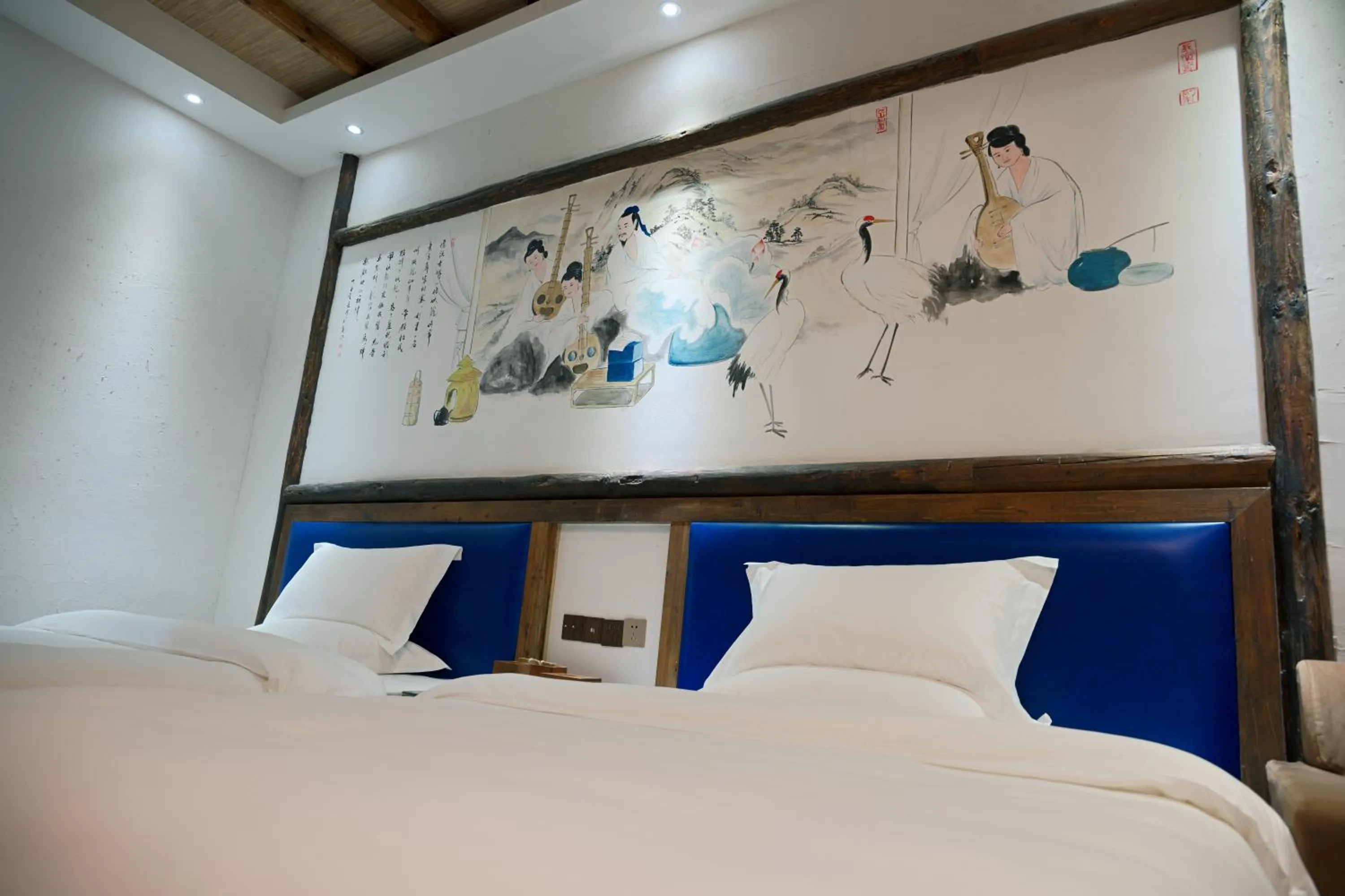 Decorative detail, Bed in Old Story Inn Lijiang Old Town