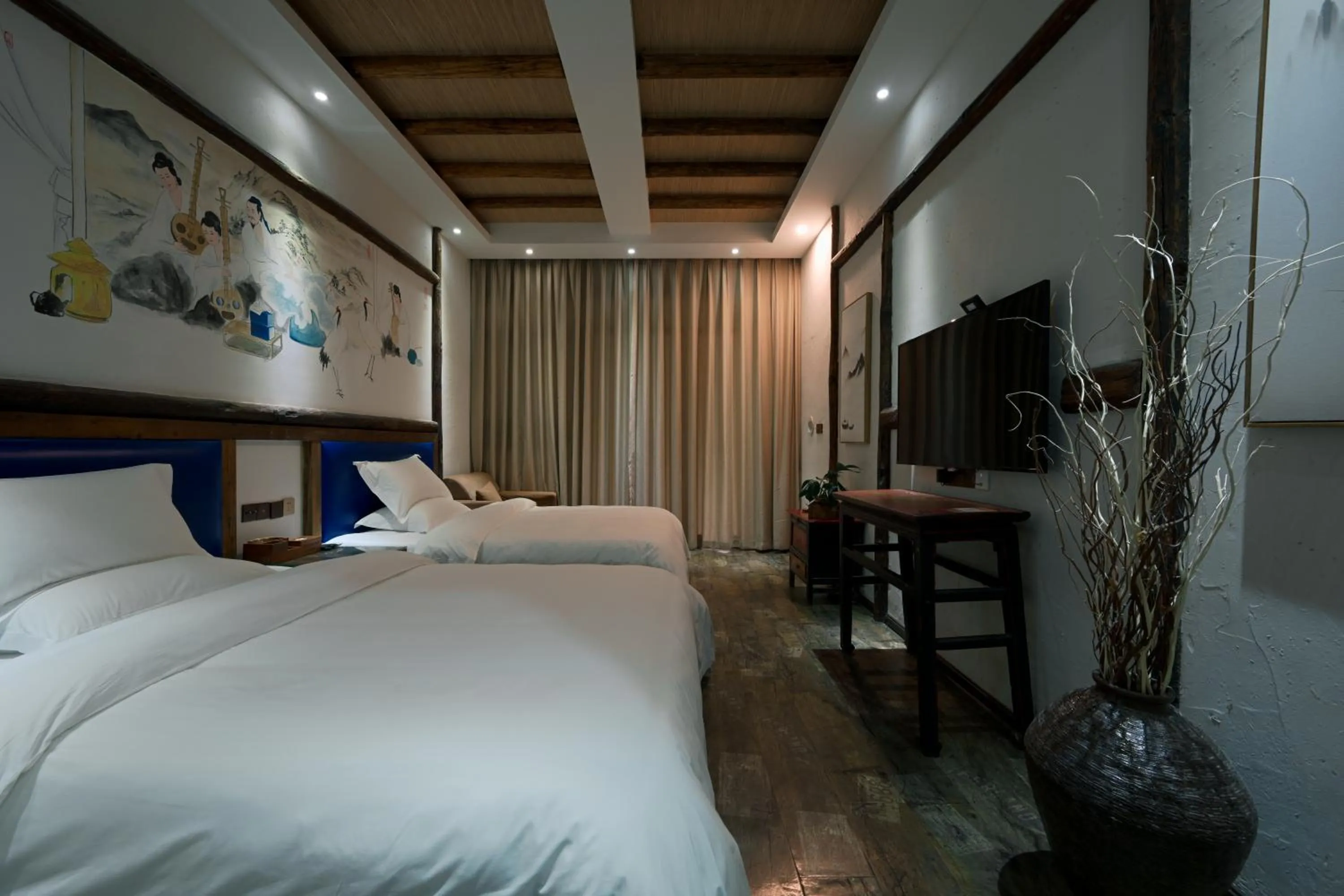 Bed in Old Story Inn Lijiang Old Town