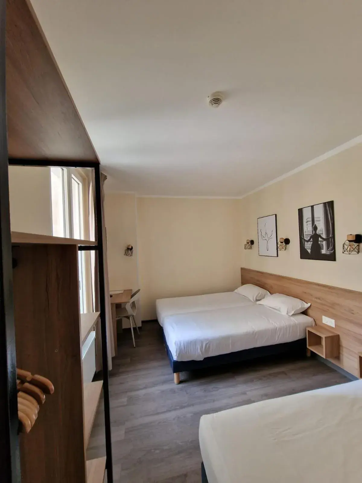 Bed in Hôtel D'Anjou Bed in Hôtel D'Anjou