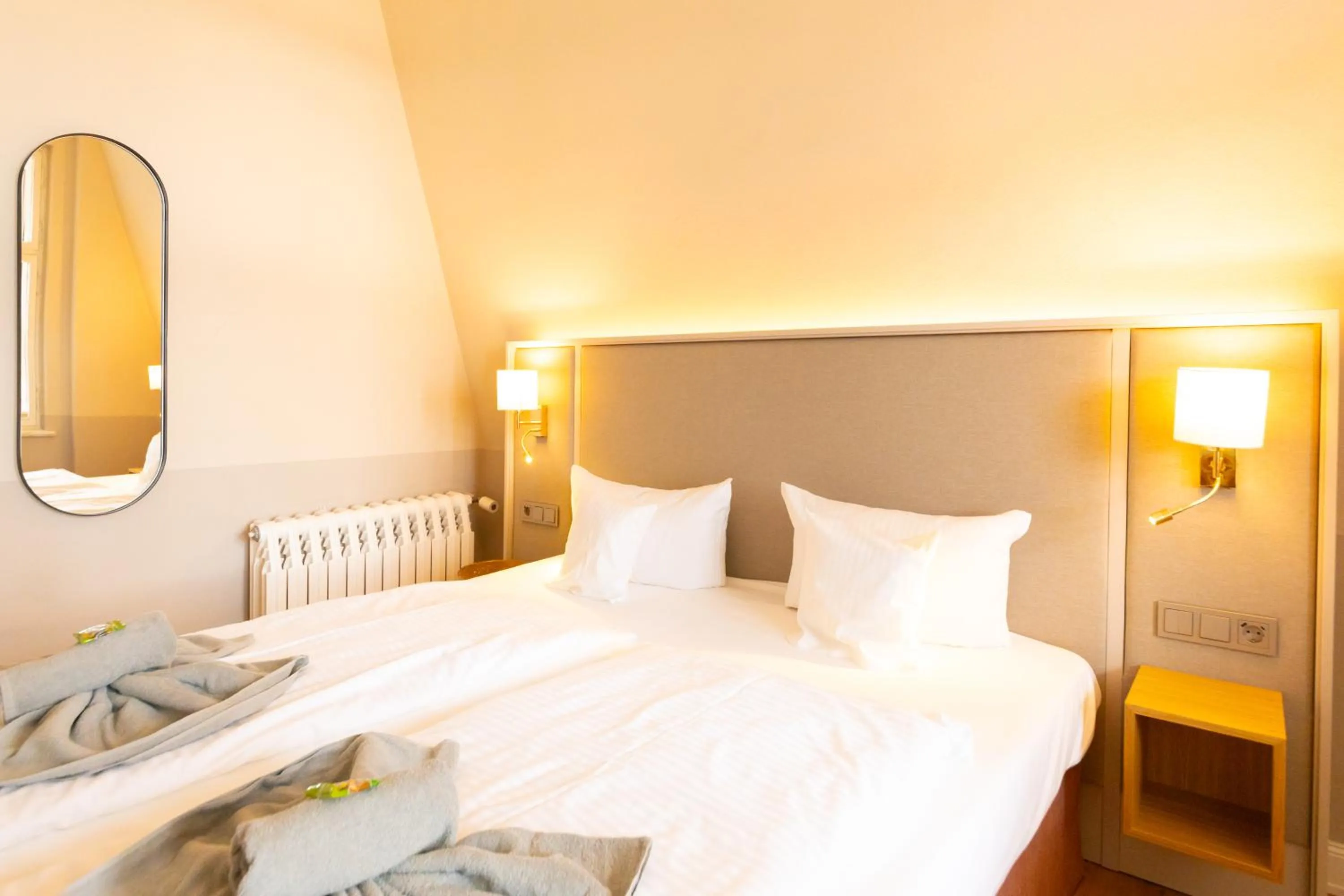 Bed in Hotel Germania