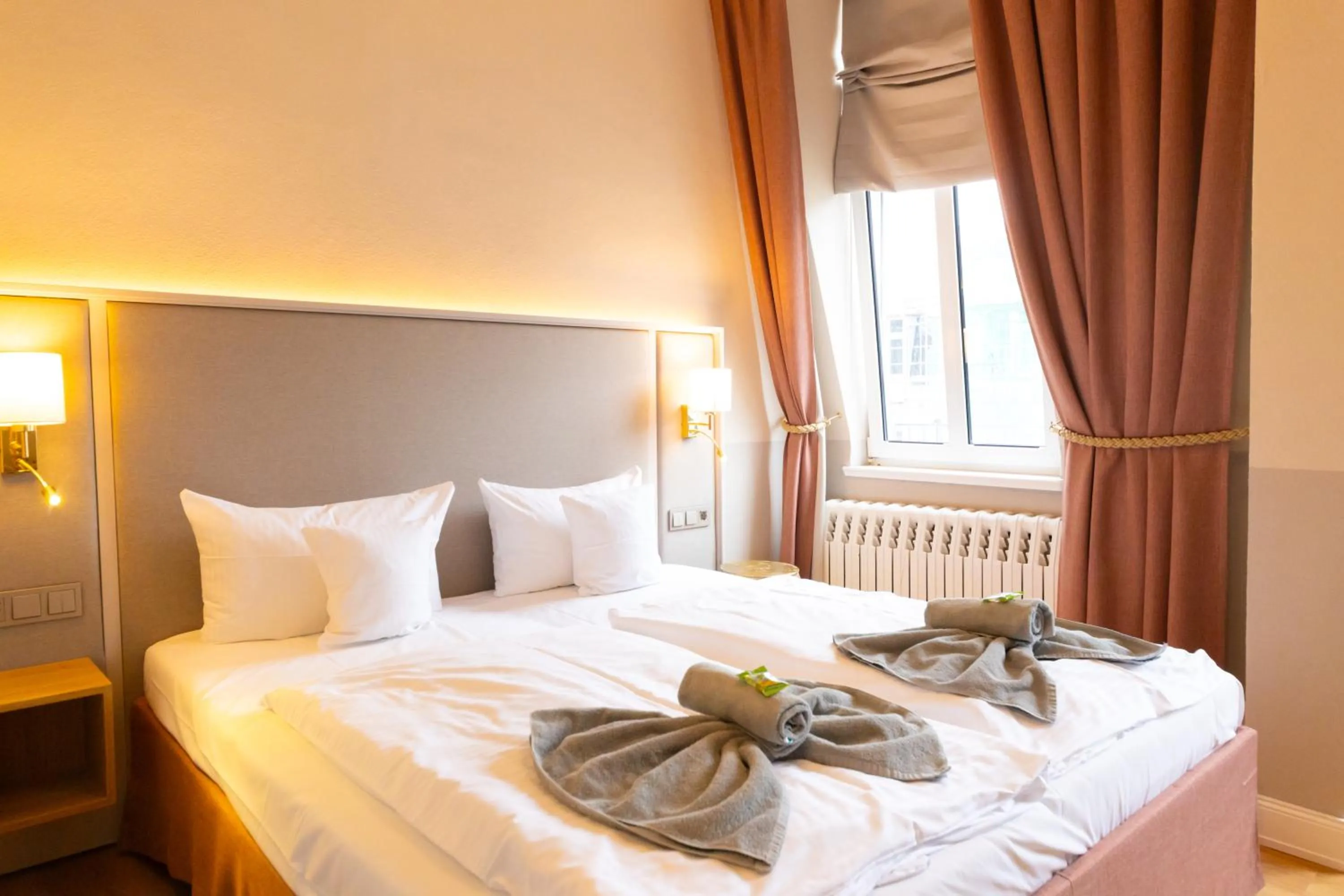 Bed in Hotel Germania