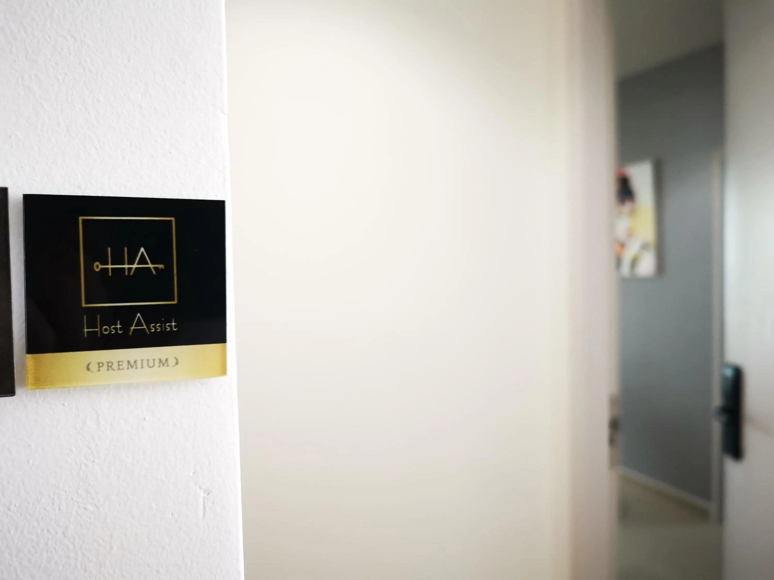 Logo/Certificate/Sign in Host Assist Homestay by HA i-City