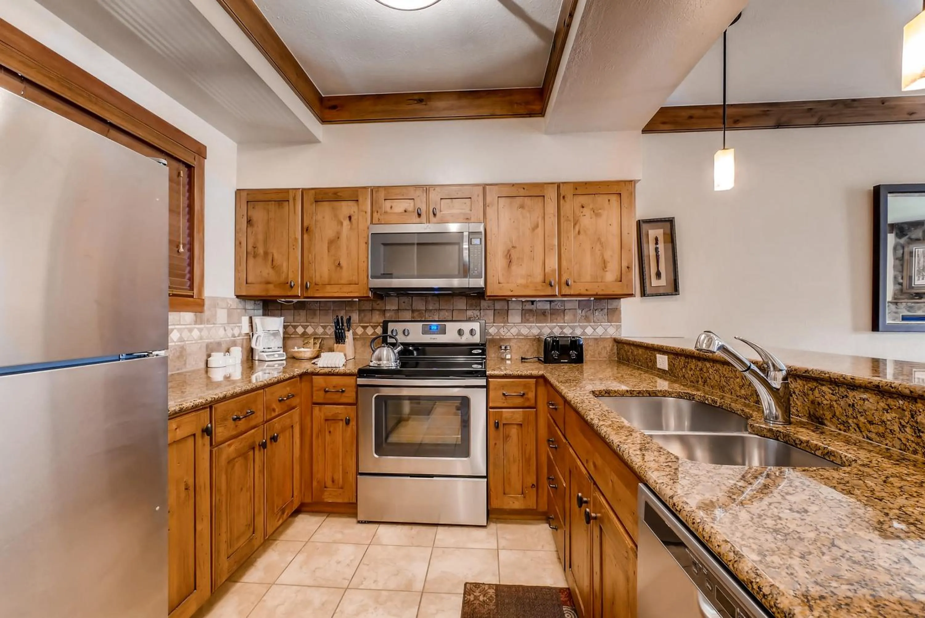 Kitchen or kitchenette in Snow Flower Condos